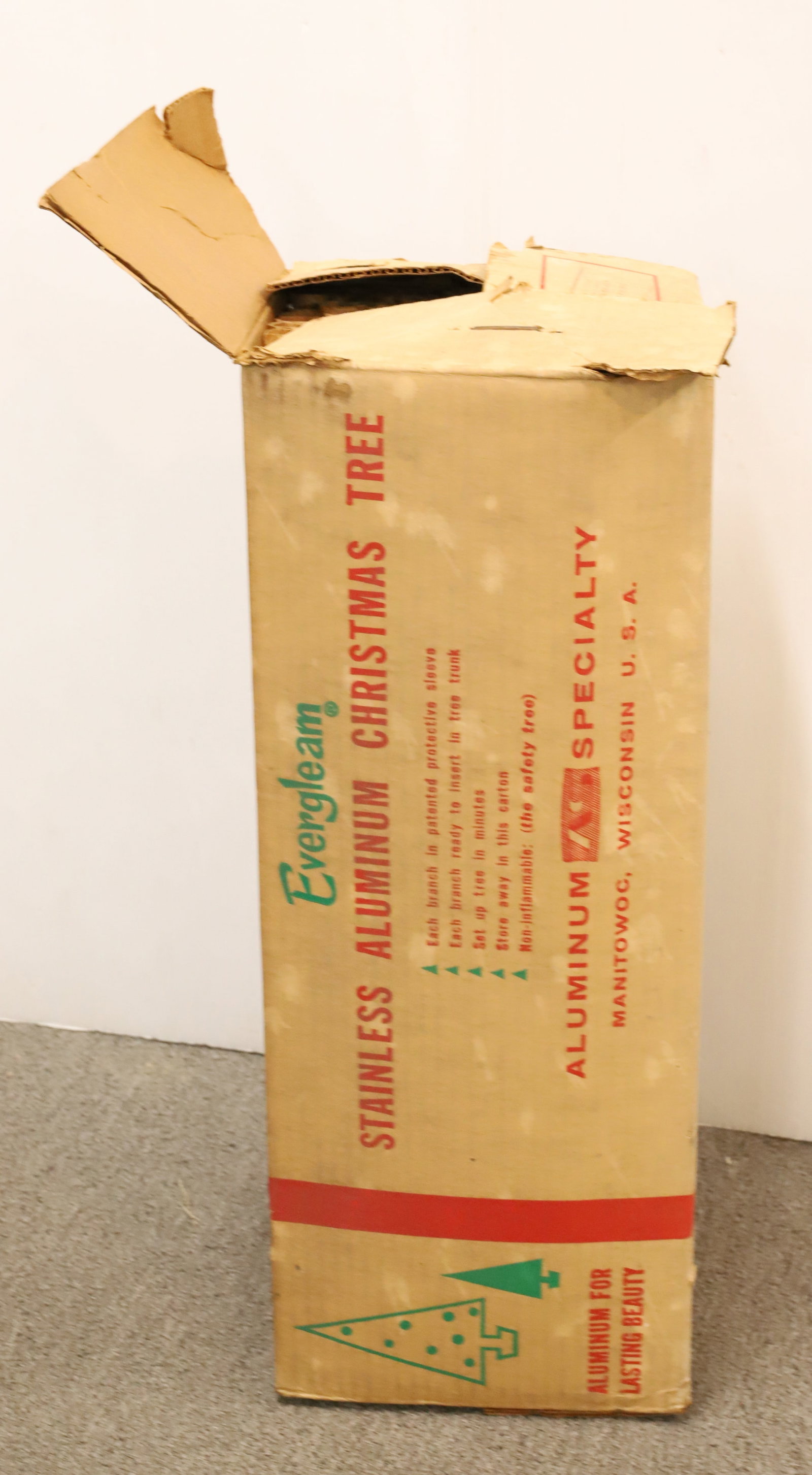 VINTAGE EVERGLEAM CHRISTMAS TREE: STAINLESS ALUMINUM TREE WITH TRIPOD STAND. NO. 4606, FOUNTAIN STYLE. 96 BRANCHES. PLEASE READ CAREFULLY - Terms for Purchasing and Shipping of Auction Items. Please read carefully before bidding. All 