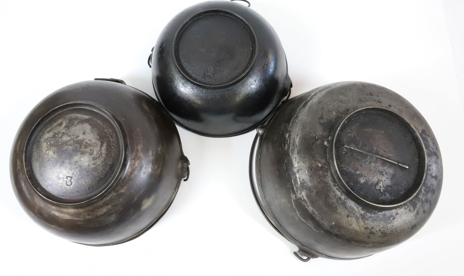 (3) CAST IRON POTS (1 of 4)