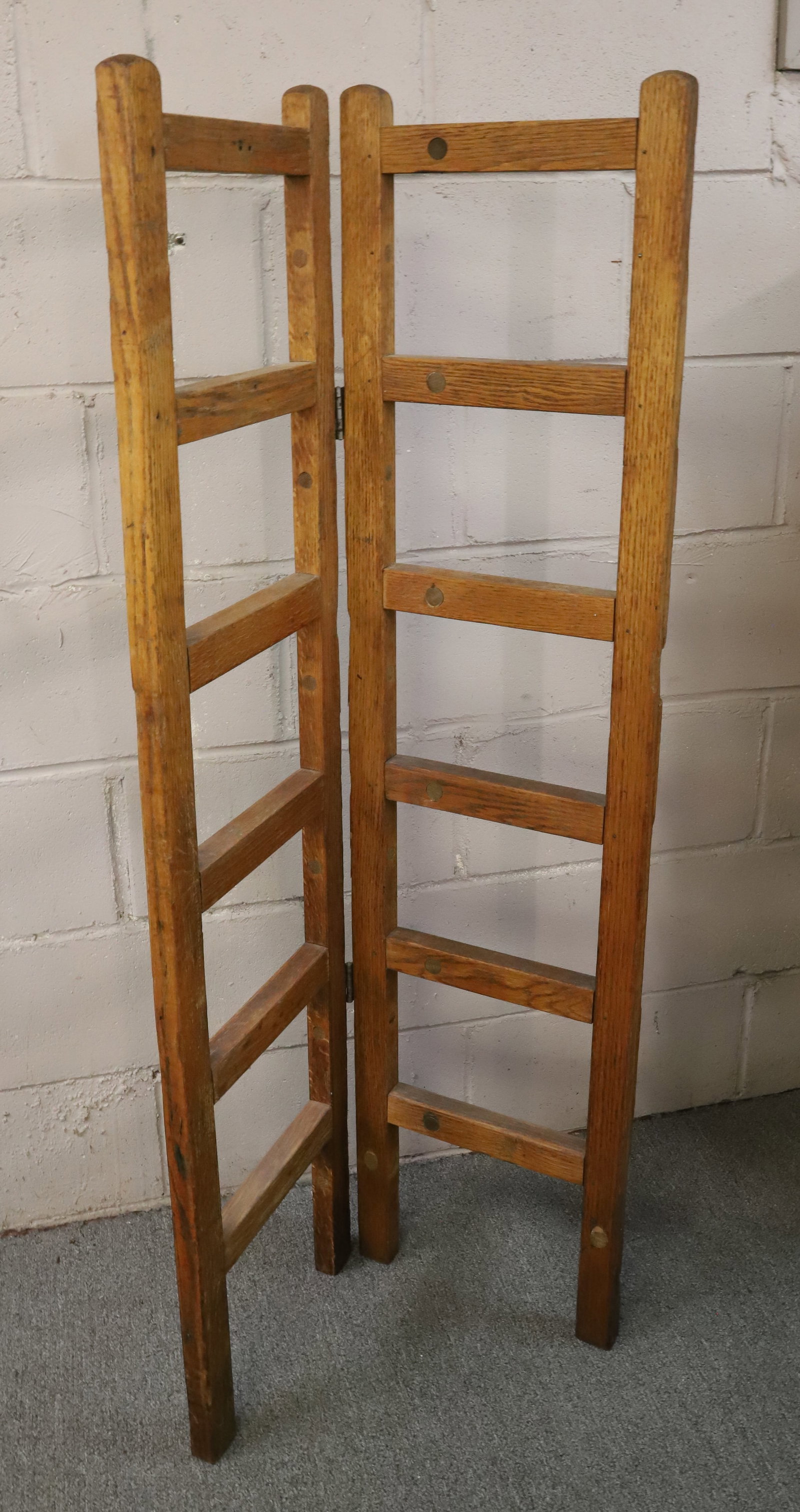 FOLDING OAK RACK: 2 PANELED DISPLAY RACK, 52 1/2" X 13" PANELS PLEASE READ CAREFULLY - Terms for Purchasing and Shipping of Auction Items. Please read carefully before bidding. All payments for purchases will be made t