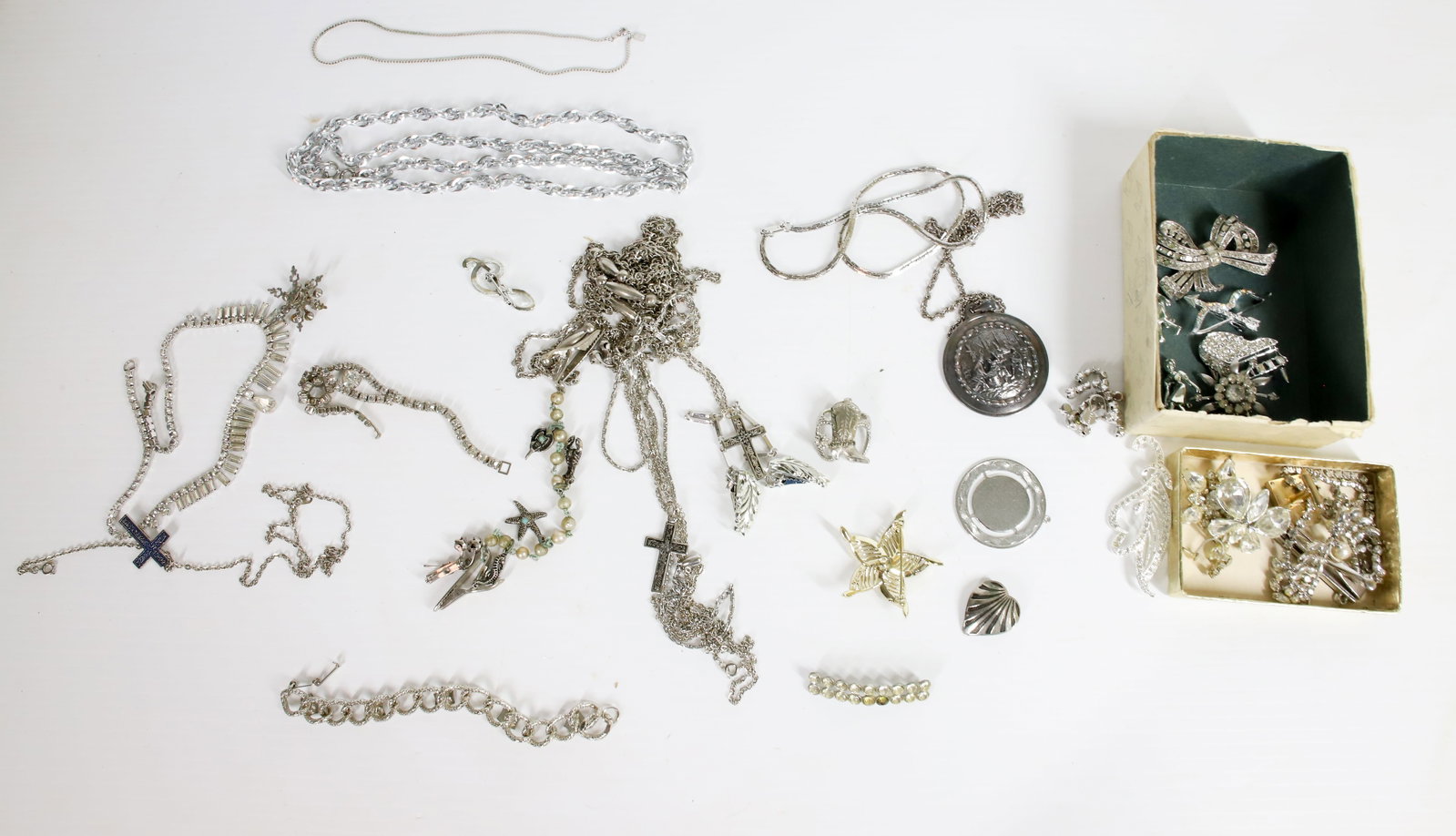 VINTAGE COSTUME JEWELRY: RHINESTONE JEWELRY, SWEATER CLIPS, CHAINS, BROOCHES ETC Terms: PLEASE READ CAREFULLY -THIS IS AN ONSITE AND ONLINE ONLY AUCTION. PICK UP WILL BE AT 5115 ANONA RD, STROUDSBURG, PA 18360 AND WILL ONLY B