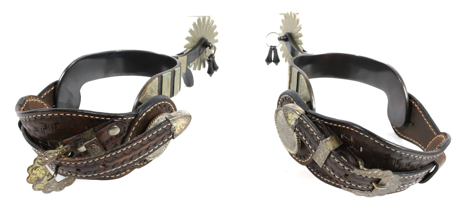 PAIR OF LEATHER/STEEL SPURS: MRKD. MONTANA SILVERSMITHS UNDER BUCKLE. 9 1/2" TOTAL LENGTH. Terms: PLEASE READ CAREFULLY -THIS IS AN ONSITE AND ONLINE ONLY AUCTION. PICK UP WILL BE AT 5115 ANONA RD, STROUDSBURG, PA 18360 AND WILL 
