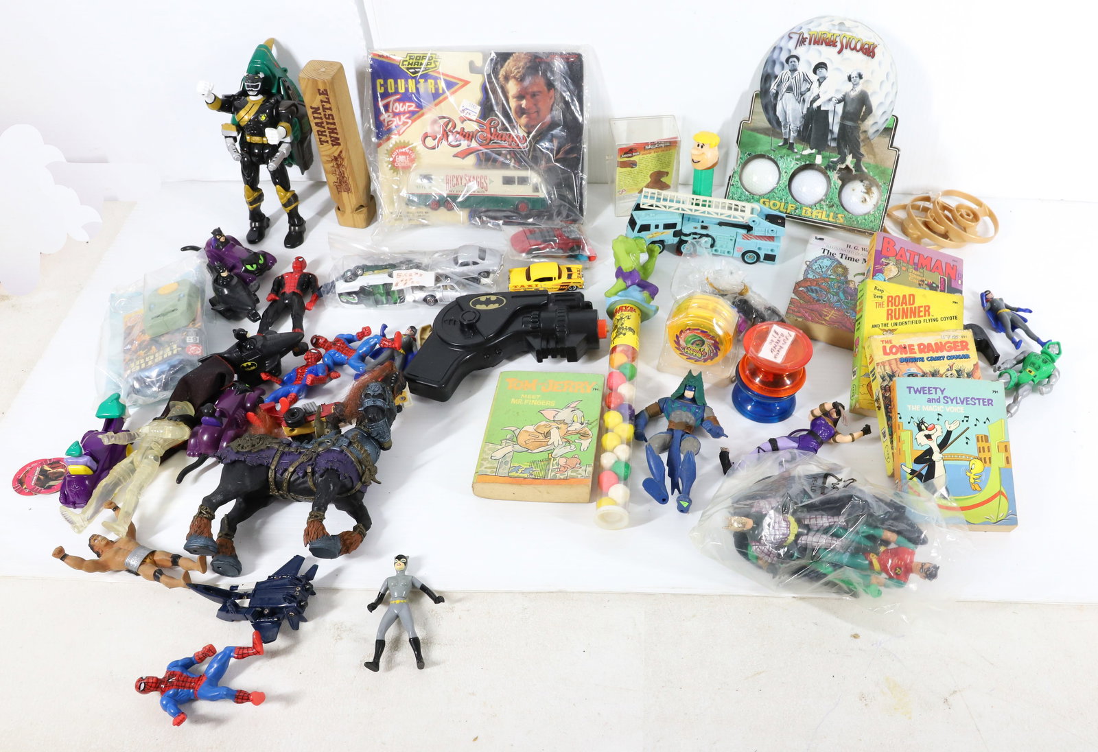 LOT OF VINTAGE TOYS: INCLUDING; ACTION FIGURES, BOOKS, GOLF BALLS, AND MORE Terms: PLEASE READ CAREFULLY -THIS IS AN ONSITE AND ONLINE ONLY AUCTION. PICK UP WILL BE AT 5115 ANONA RD, STROUDSBURG, PA 18360 AND WILL ONLY BE