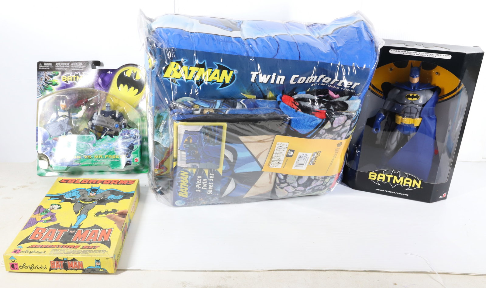 LOT OF BATMAN ITEMS: INCLUDING; TWIN COMFORTER, BATMAN COLLECTOR FIGURE IN BOX, COLORFORMS, AND ACTION FIGURES Terms: PLEASE READ CAREFULLY -THIS IS AN ONSITE AND ONLINE ONLY AUCTION. PICK UP WILL BE AT 5115 ANONA RD, STR