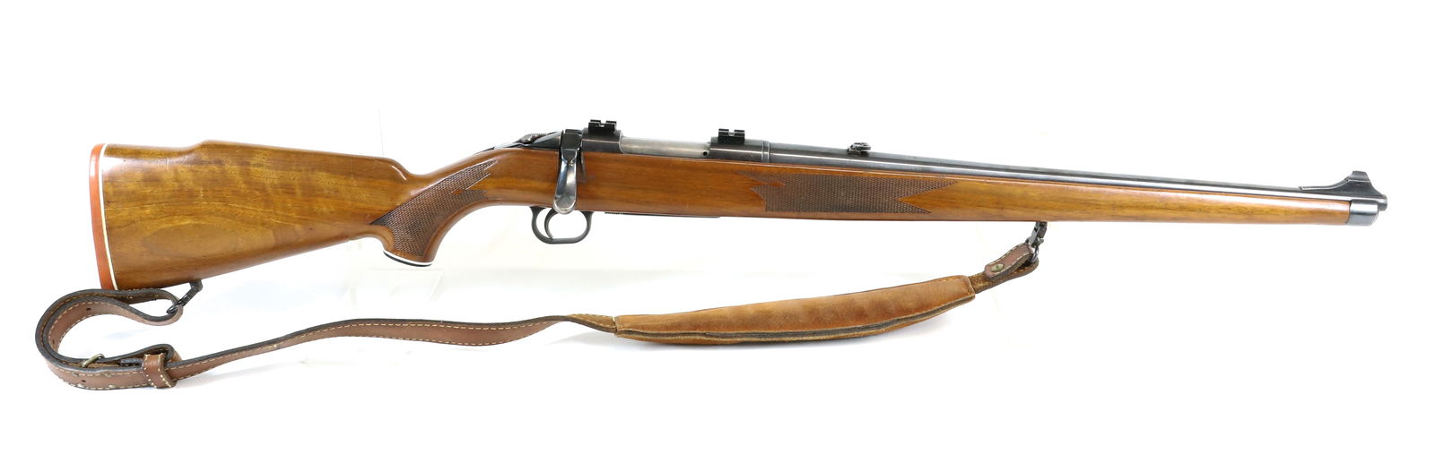 MOSSBERG MODEL 800 AM BOLT ACTION RIFLE: 308 WIN, SERIAL# 143412, MANNLICHER STYLE, LEATHER SLING, AND 21" BARREL Registration: Terms: THIS GUN REQUIRES REGISTRATION OR AN FFL TRANSFER TO PURCHASE
