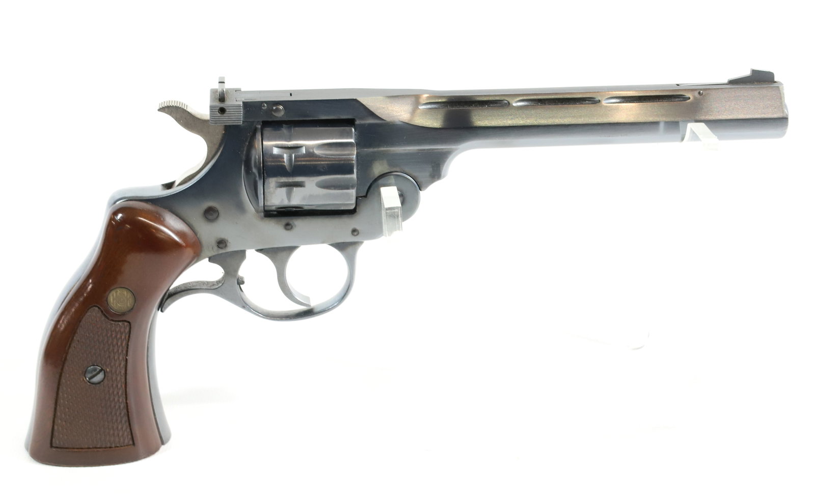 H&R MODEL 999 REVOLVER: .22 LR, SERIAL# BAD19319, 6" BARREL, IN BLUE FINISH Registration: Terms: THIS GUN REQUIRES REGISTRATION OR AN FFL TRANSFER TO PURCHASE