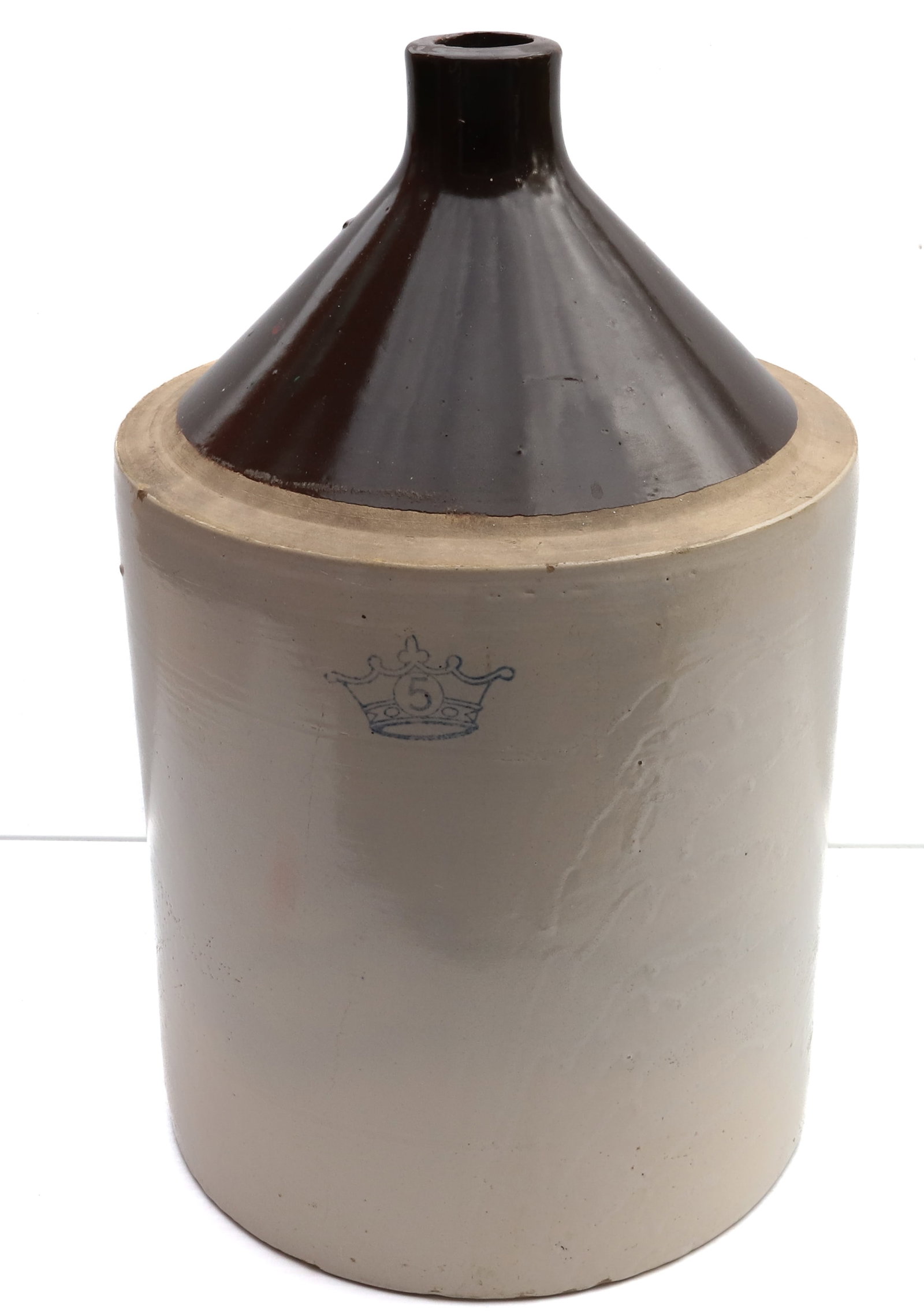 5 GALLON STONEWARE JUG: BROWN AND WHITE GLAZE - STAMPED 5 - 19 1/2" H Terms: PLEASE READ CAREFULLY -THIS IS AN ONLINE ONLY AUCTION. Terms for Purchasing and Shipping of Auction Items. Please read carefully before bidding. Al