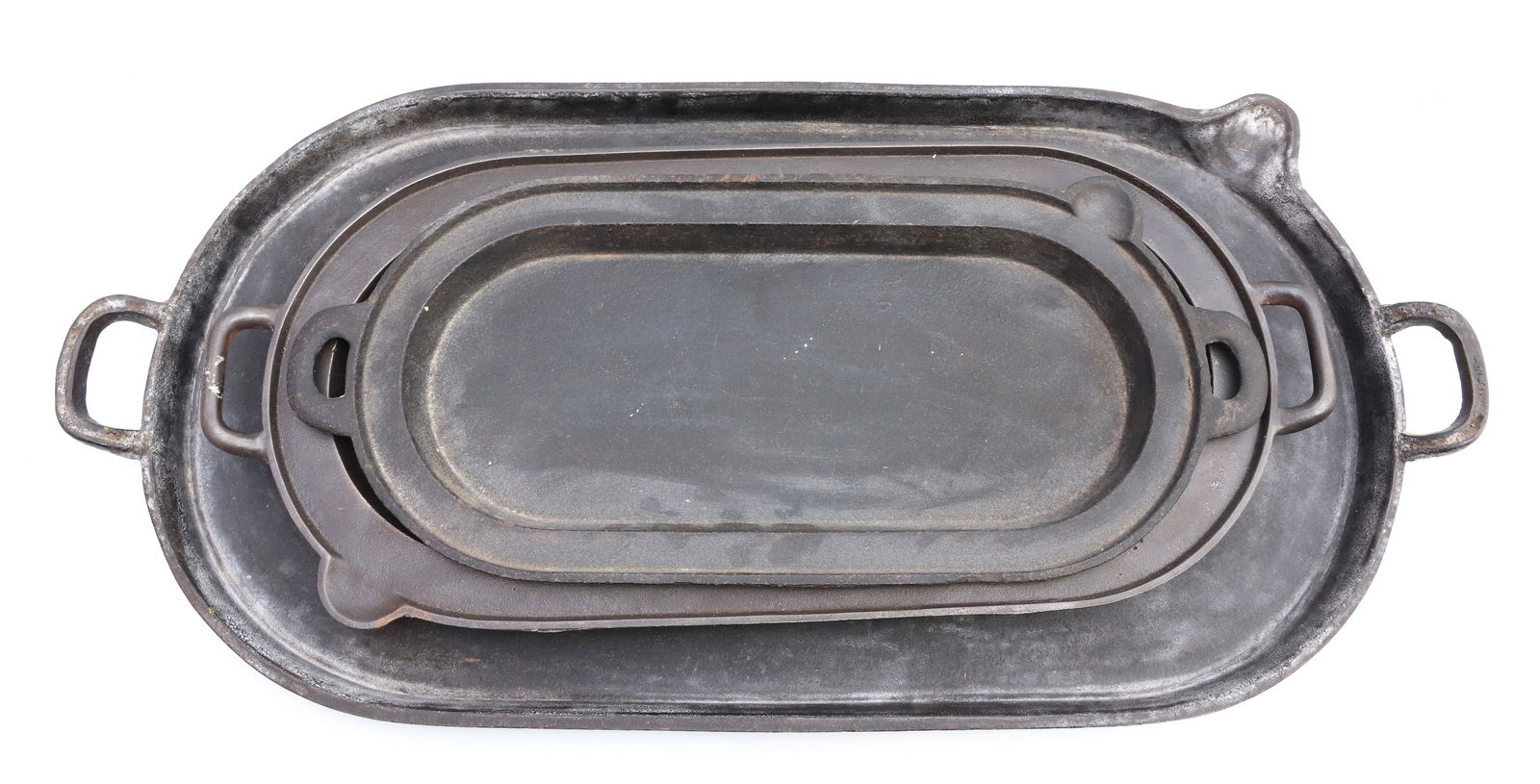 (3) CAST IRON OVAL SKILLETS/GRIDDLES (1 of 7)