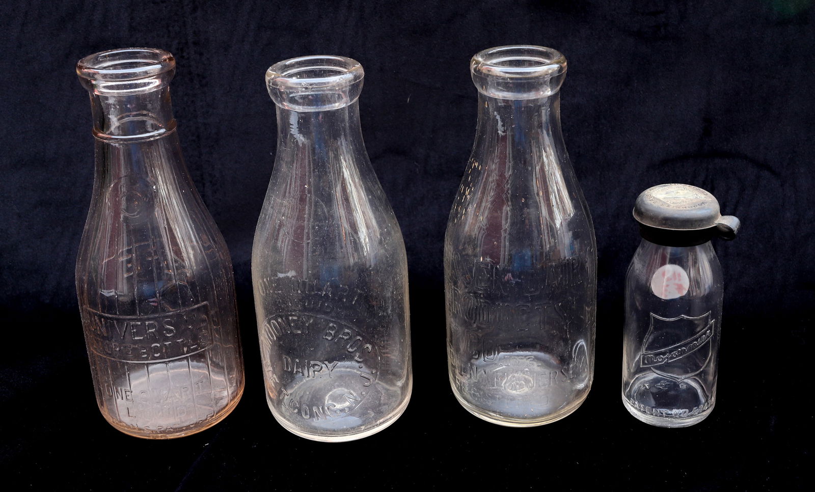 LOT OF EMBOSSED MILK BOTTLES Q (1 of 5)