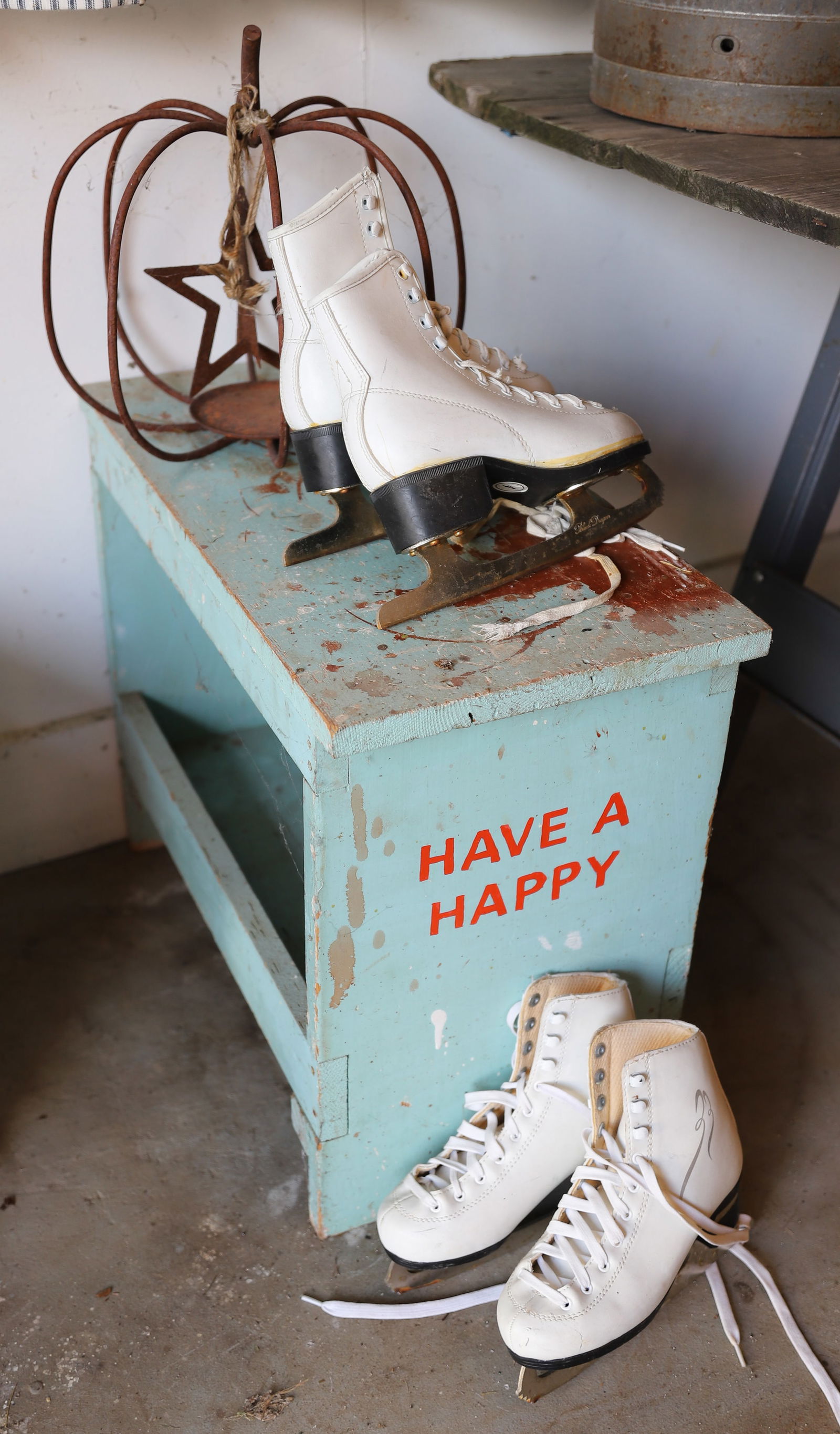 PAINTED WOODEN BENCH AND ICE SKATES (1 of 2)