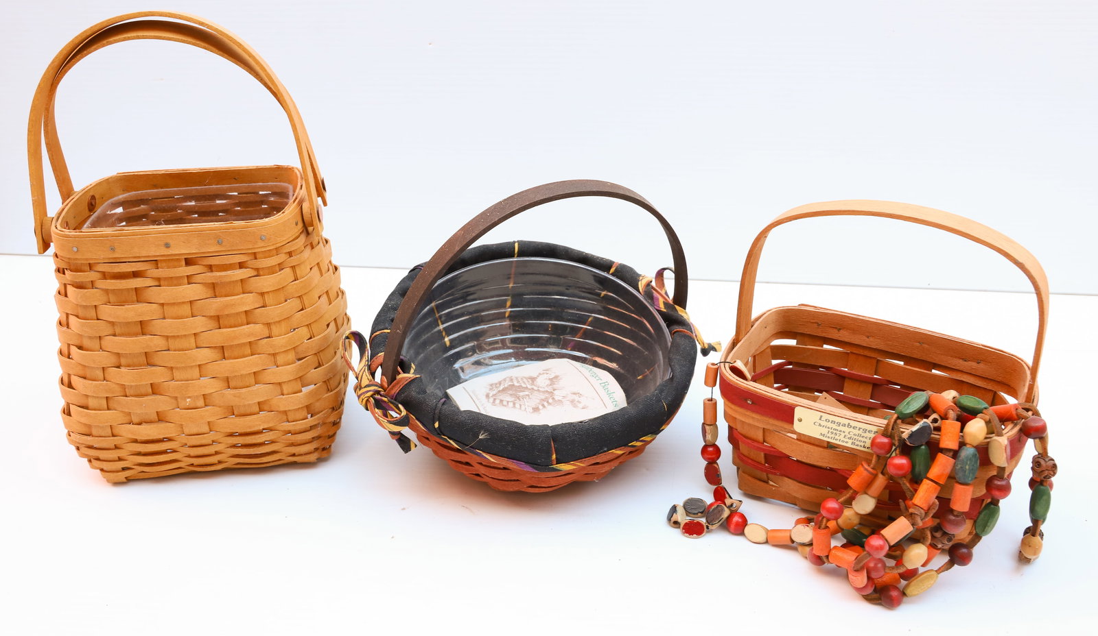 LONGABERGER BASKET LOT: (3) BASKETS Terms: PLEASE READ CAREFULLY -THIS IS AN ONLINE ONLY AUCTION. Terms for Purchasing and Shipping of Auction Items. Please read carefully before bidding. All payments for purchases will be m