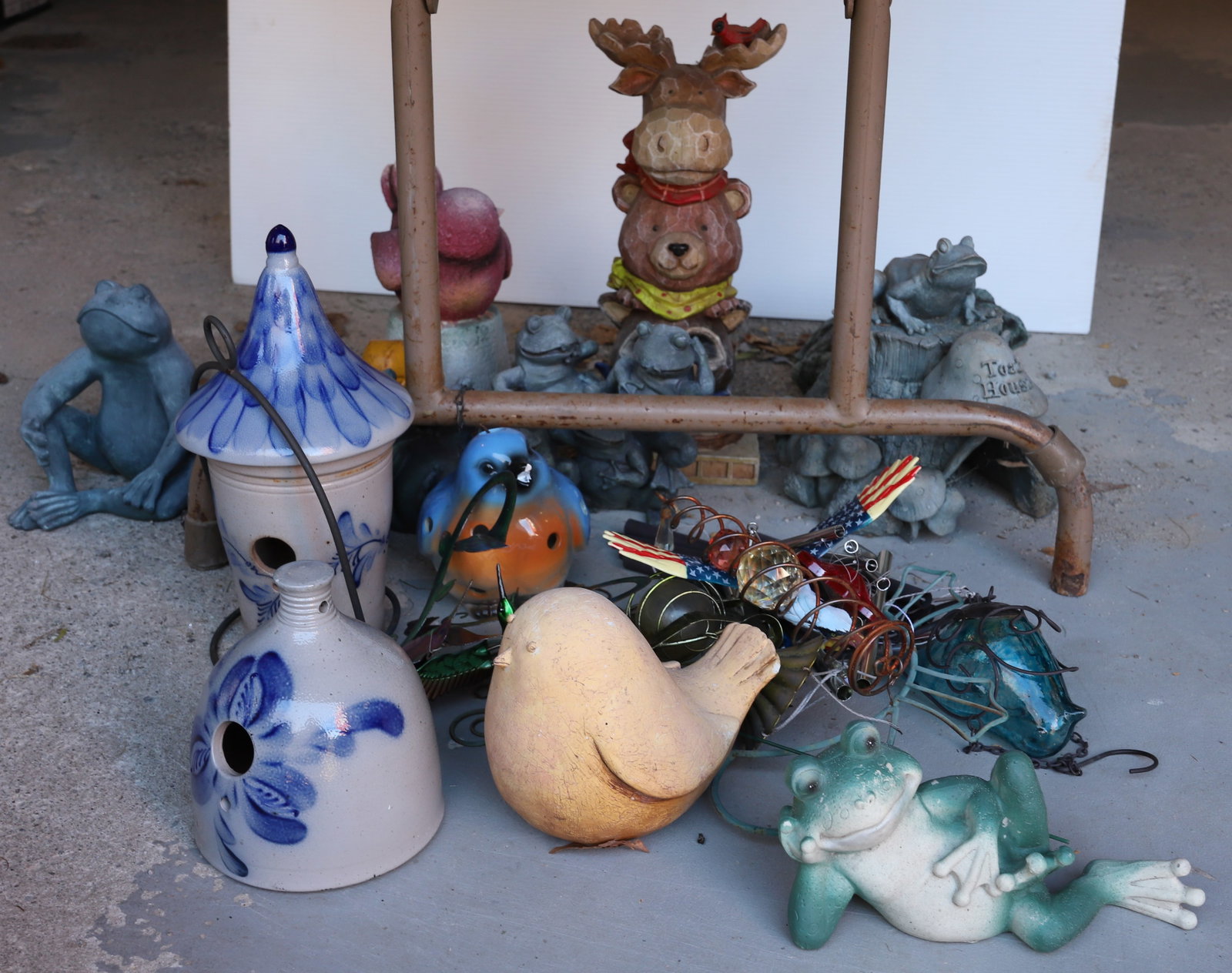 GARDEN AND PATIO DECOR: DECORATIONS FOR THE GARDEN INCLUDING, BLUE DECORATED POTTERY, BIRDS, FROGS AND MORE Terms: PLEASE READ CAREFULLY -THIS IS AN ONLINE ONLY AUCTION. Terms for Purchasing and Shipping of Auction Items. Pl