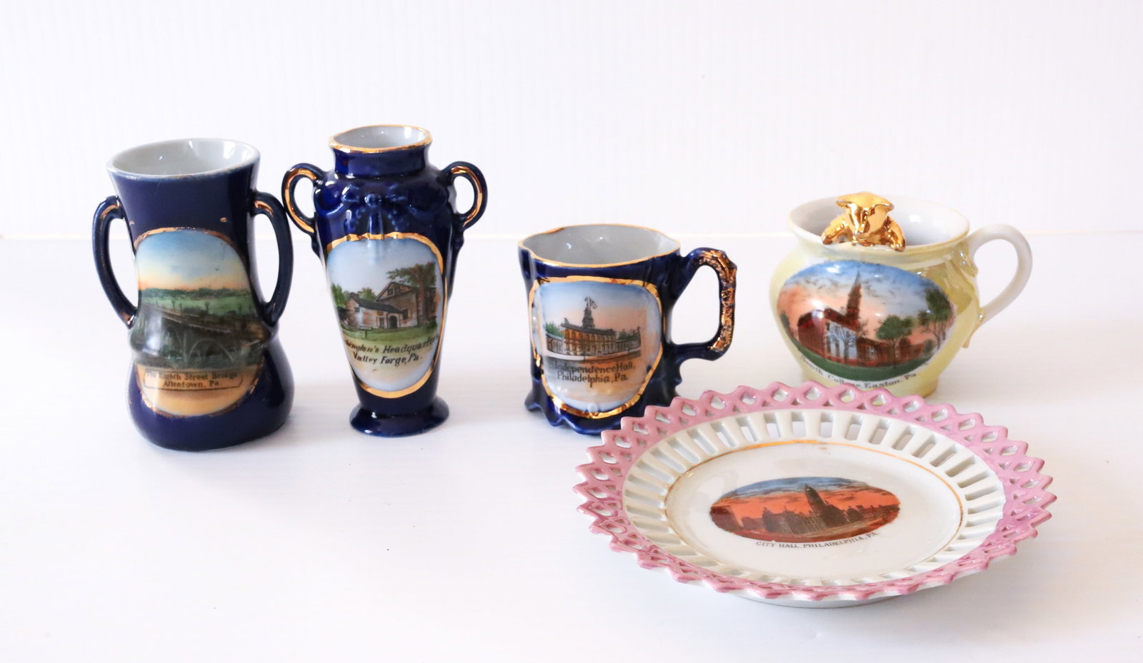 LOT OF PENNSYLVANIA SOUVENIR PIECES: (5) INCLUDING - VALLEY FORGE, EASTON, ALLENTOWN, AND PHILADELPHIA - ALL MADE IN GERMANY, TALLEST 3 1/2" Terms: PLEASE READ CAREFULLY -THIS IS AN ONLINE ONLY AUCTION. Terms for Purchasing and Shipping 