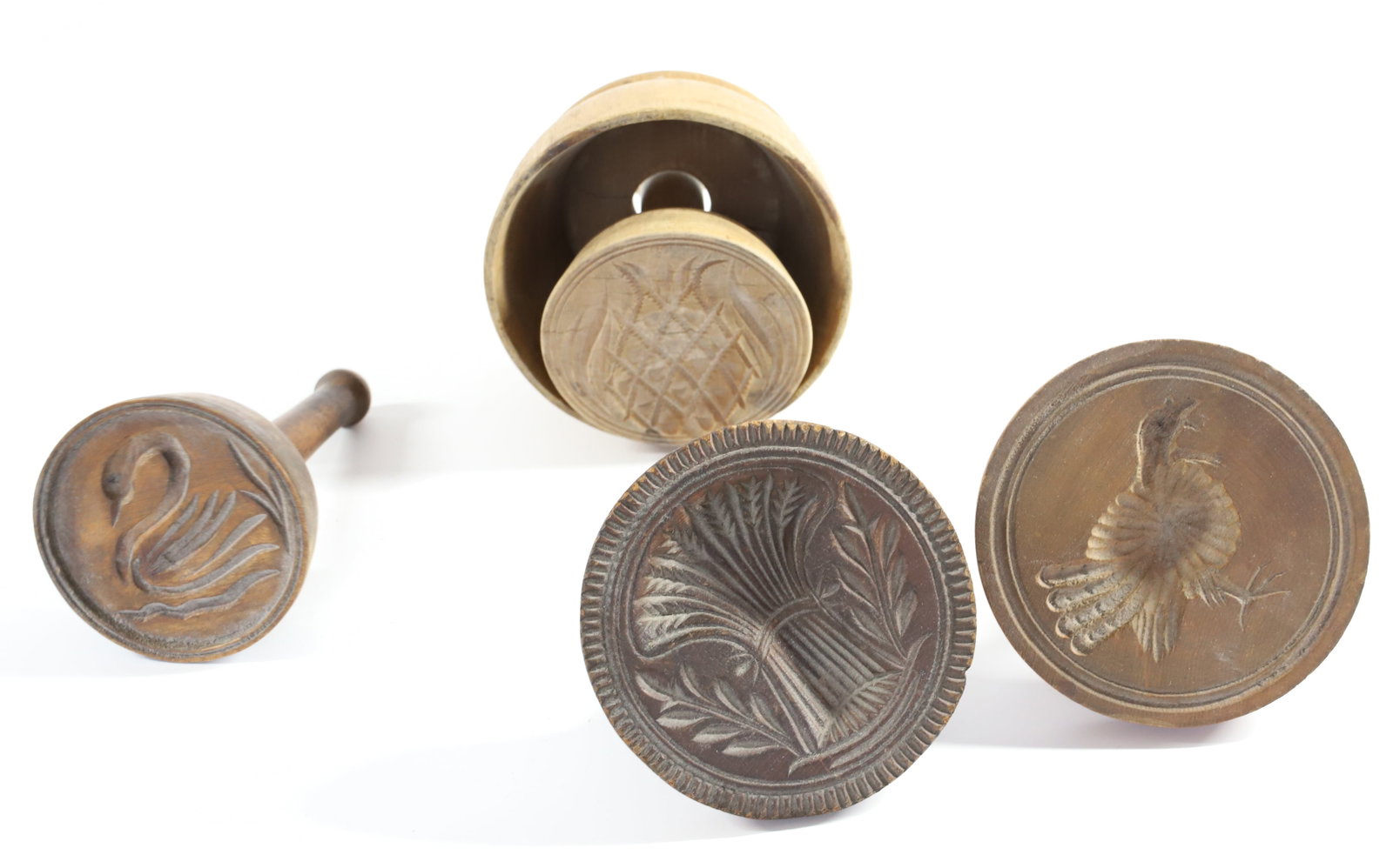 (4) WOODEN BUTTER STAMPS: SHEAF OF WHEAT, TURKEY, SWAN, AND (2) PIECE PINEAPPLE MOTIF MOLD - LARGEST DIAMETER 4 1/4" Terms: PLEASE READ CAREFULLY -THIS IS AN ONLINE ONLY AUCTION. Terms for Purchasing and Shipping of Auction It