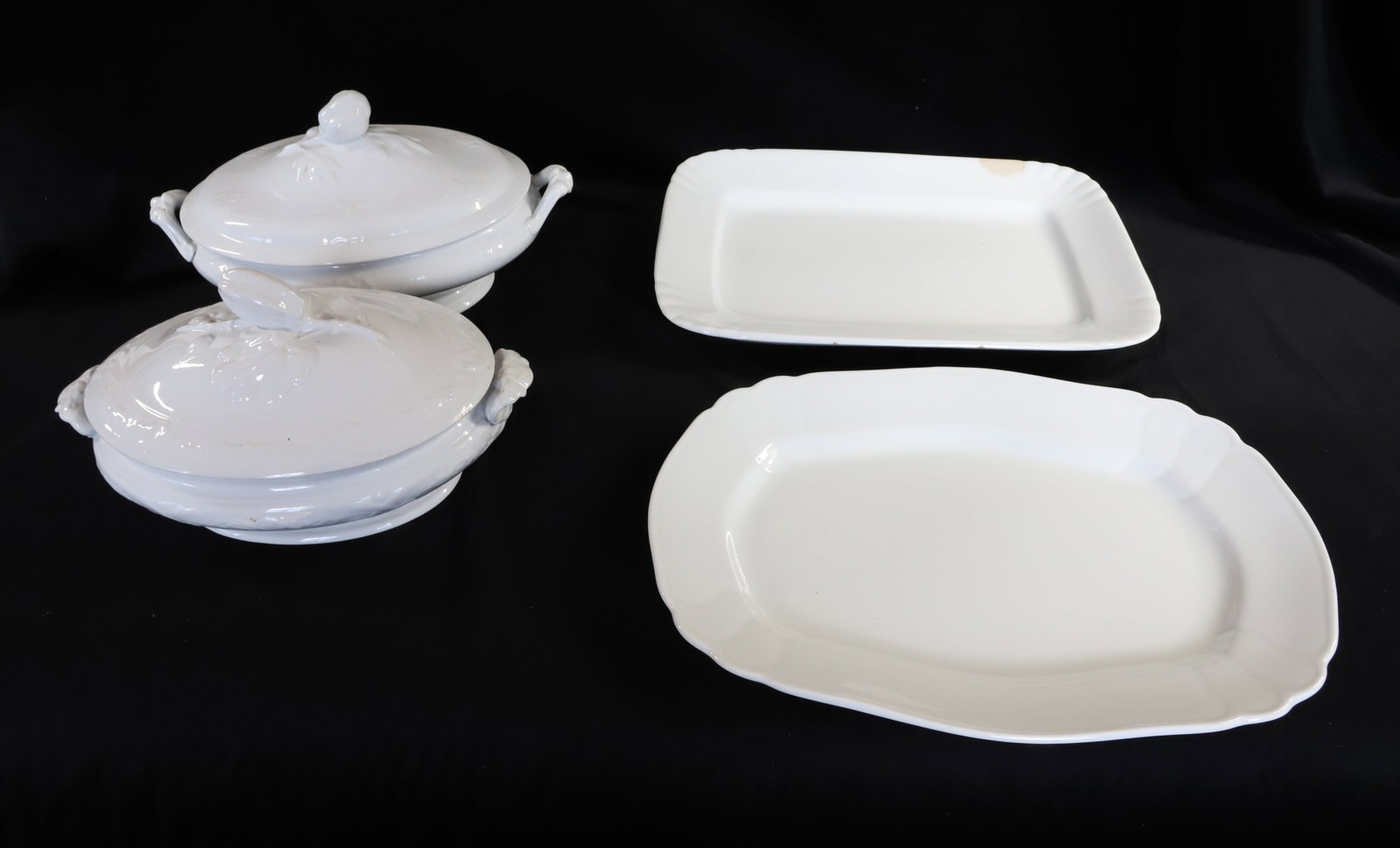 ANTIQUE IRONSTONE LOT: (4) PIECES INCLUDING; (2) PLATTERS AND (2) COVERED VEGETABLE DISHES - ONE MARKED; POWELL AND BISHOP (11 1/2") - PLATTERS MARKED ENGLAND AND ARE 14" Terms: PLEASE READ CAREFULLY -THIS IS AN ONLINE ONLY
