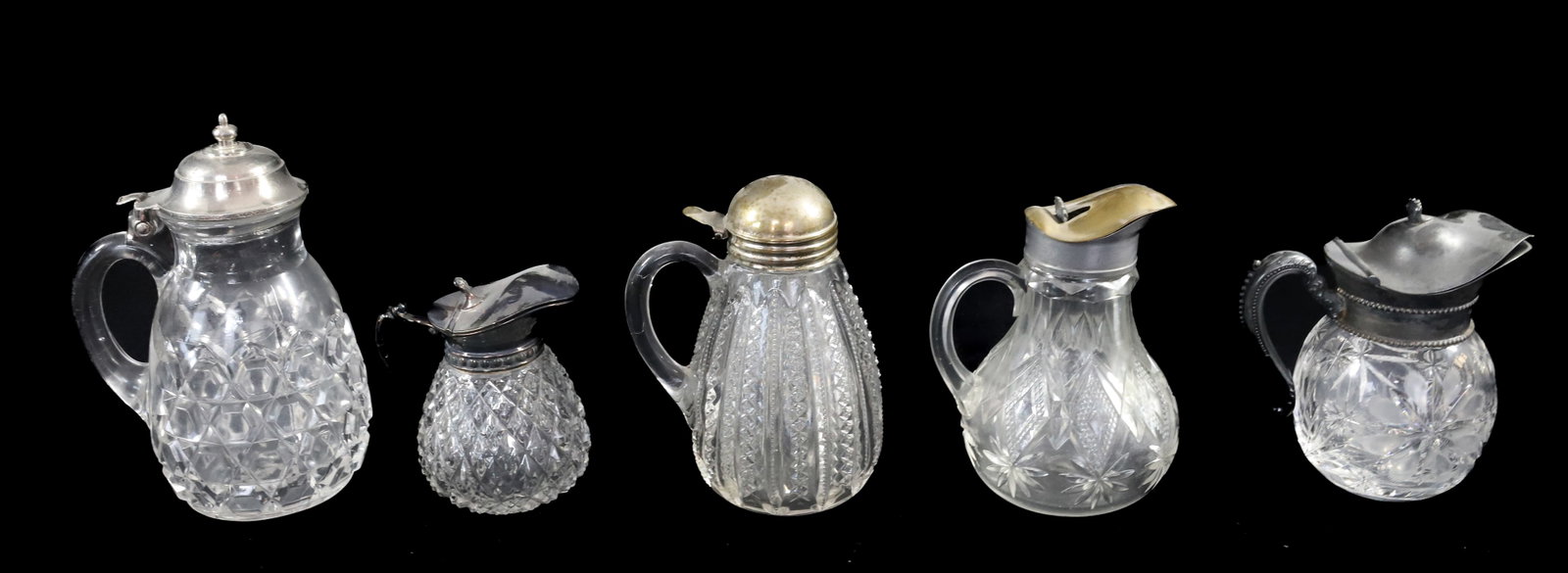 (5) VICTORIAN SYRUPS: SILVER PLATED TOPS, TALLEST 6 3/4" Terms: PLEASE READ CAREFULLY -THIS IS AN ONLINE ONLY AUCTION. Terms for Purchasing and Shipping of Auction Items. Please read carefully before bidding. All payments 
