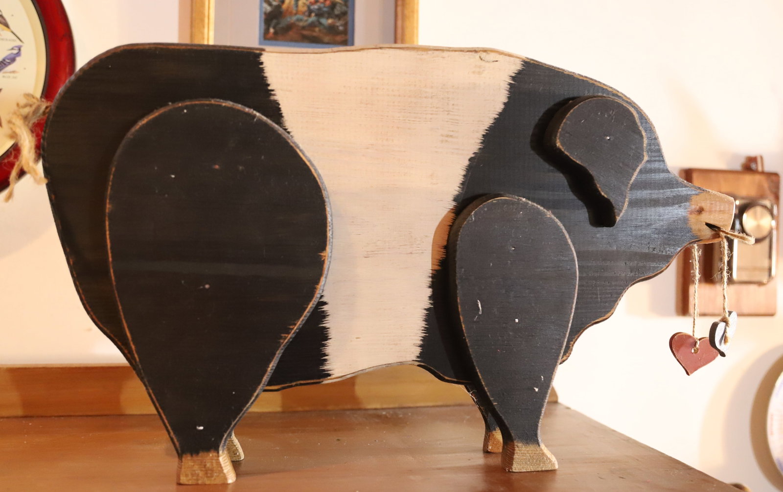 FOLK ART WOODEN PIG: PAINTED WOODEN STANDING PIG - 22 1/2" L Terms: PLEASE READ CAREFULLY -THIS IS AN ONLINE ONLY AUCTION. Terms for Purchasing and Shipping of Auction Items. Please read carefully before bidding. All paym