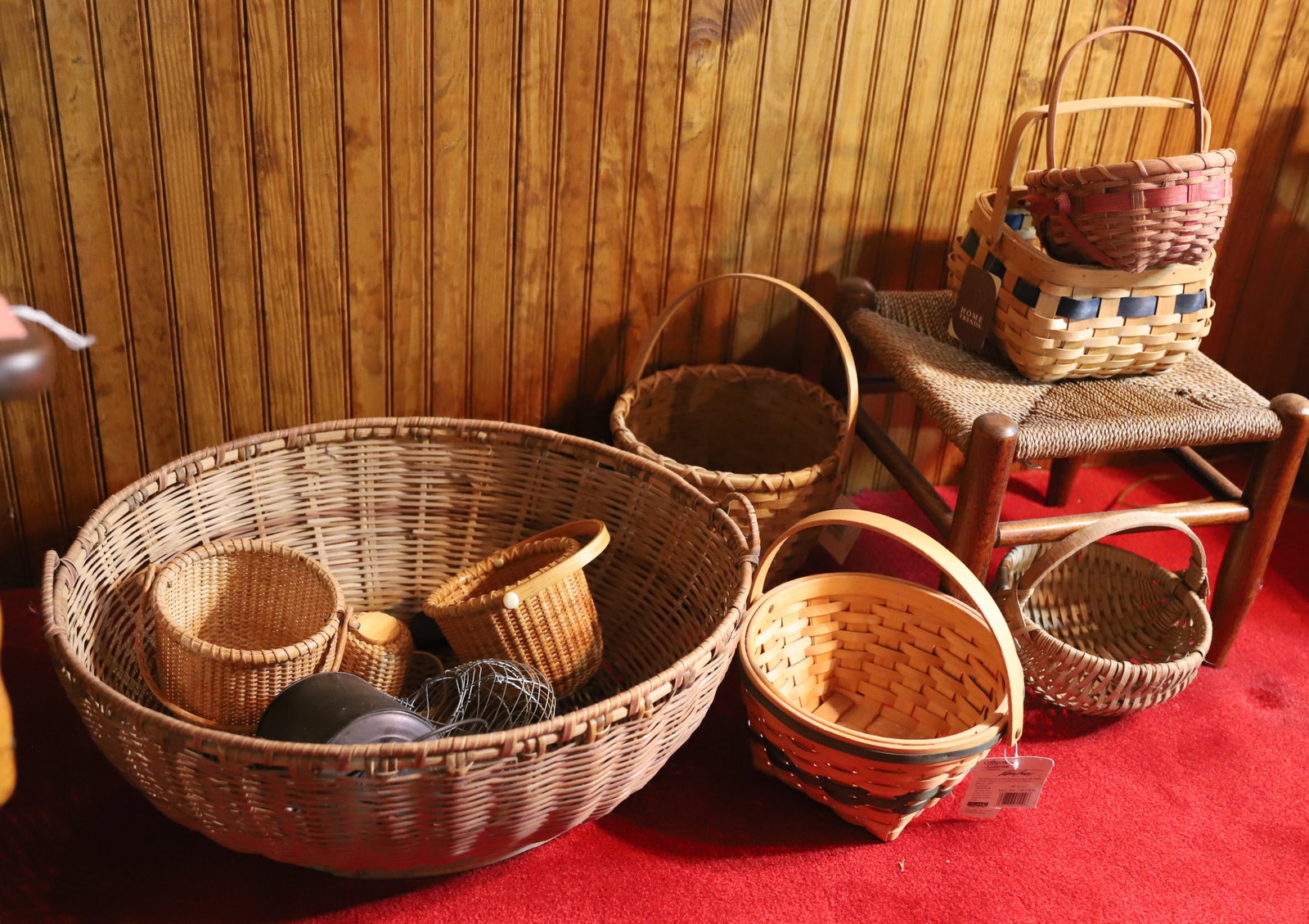 LOT OF BASKETS AND STOOL: NANTUCKET AND LONGABERGER STYLE BASKETS, STOOL AND MORE Terms: PLEASE READ CAREFULLY -THIS IS AN ONLINE ONLY AUCTION. Terms for Purchasing and Shipping of Auction Items. Please read carefully before b