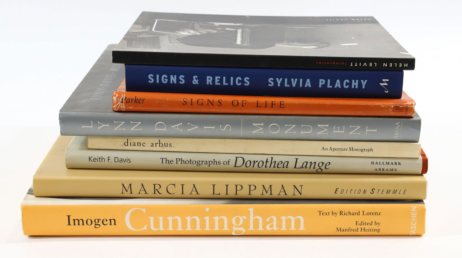 LOT OF ART PHOTOGRAPHY COFFEE TABLE BOOKS: (8) INCLUDING: SYLVIA PLACHY, SIGNS AND RELICS, 1999. HELEN LEVITT, FOTOGRAFIAS, 1994/1995. OLIVER PARKER, SIGNS OF LIFE, 1978. LYNN DAVIS, MONUMENT, 1999. DIANE ARBUS, 1972. THE PHOTOGRAPHS OF DOROTH
