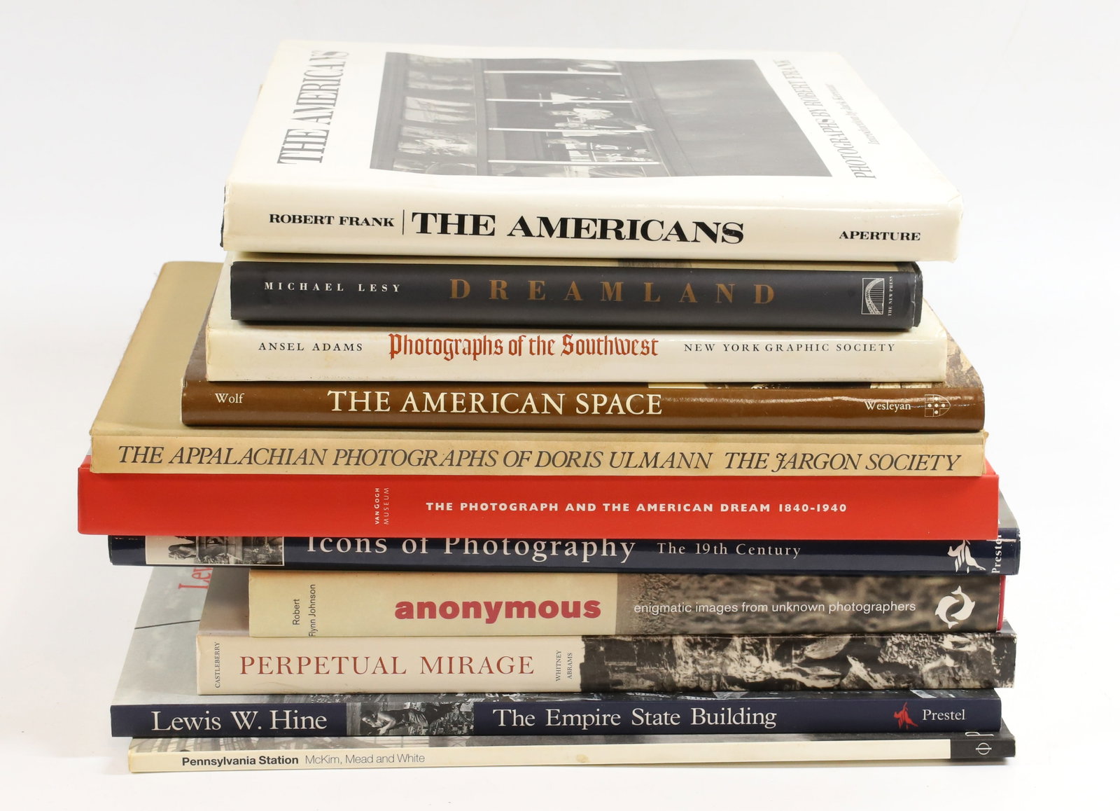 LOT OF ART PHOTOGRAPHY COFFEE TABLE BOOKS: (11) INCLUDING: THE EMPIRE STATE BUILDING, 2001. PENNSYLVANIA STATION, 1996 (NON MINT COPY). PERPETUAL MIRAGE, PHOTOGRAPHIC NARRATIVES OF THE DESERT WEST, 1996. ANONYMOUS, 2004. ICONS OF PHOTOGRAPHY, 