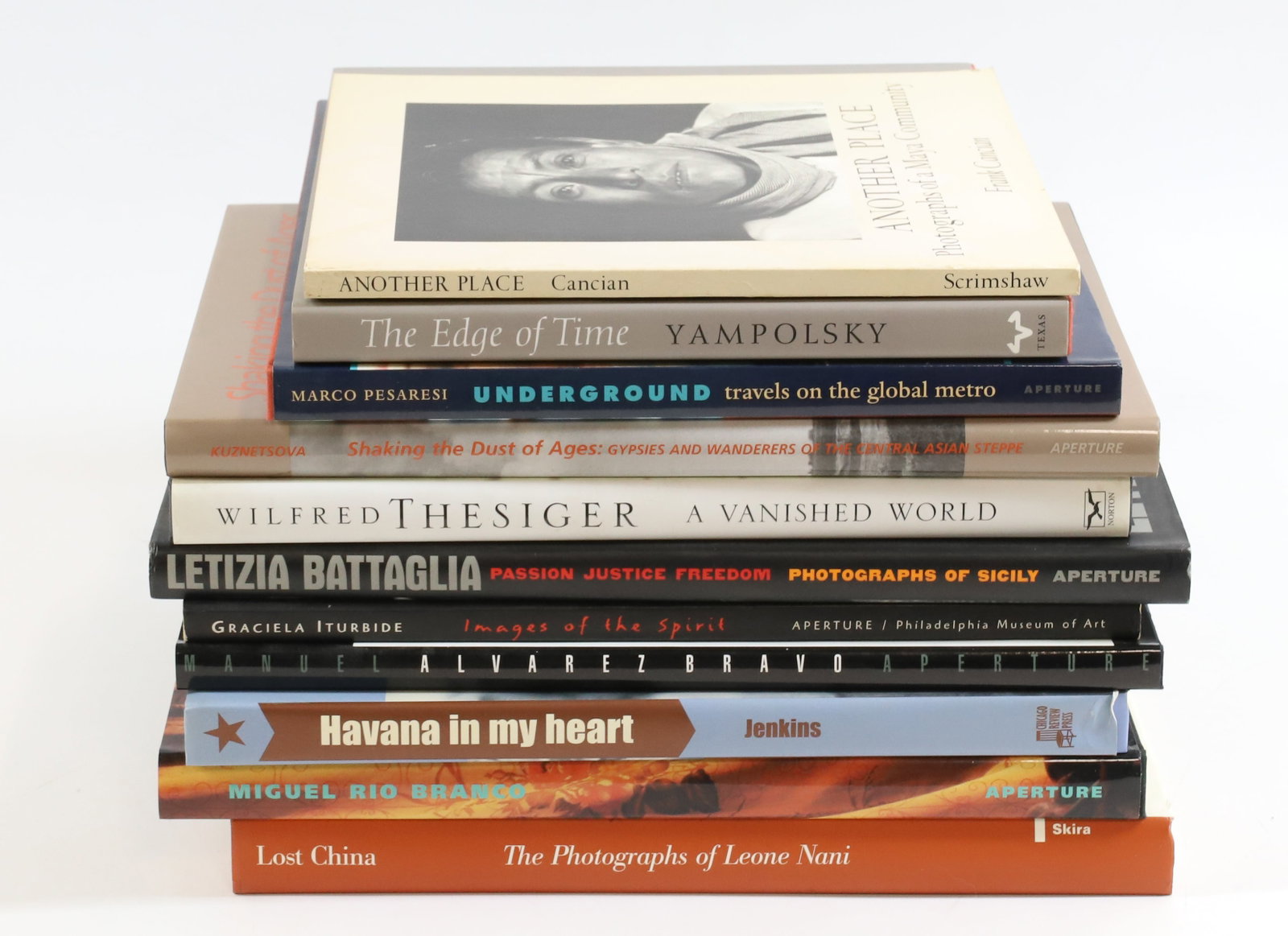 LOT OF ART PHOTOGRAPHY COFFEE TABLE BOOKS: (11) INCLUDING: THE EDGE OF TIME, PHOTOGRAPHS OF MEXICO, 1998. ANOTHER PLACE, PHOTOGRAPHS OF A MAYA COMMUNITY, 1974. WILFRED THESIGER, A VANISHED WORLD, 2001. SHAKING THE DUST OF AGES, GYPSIES AND WAN