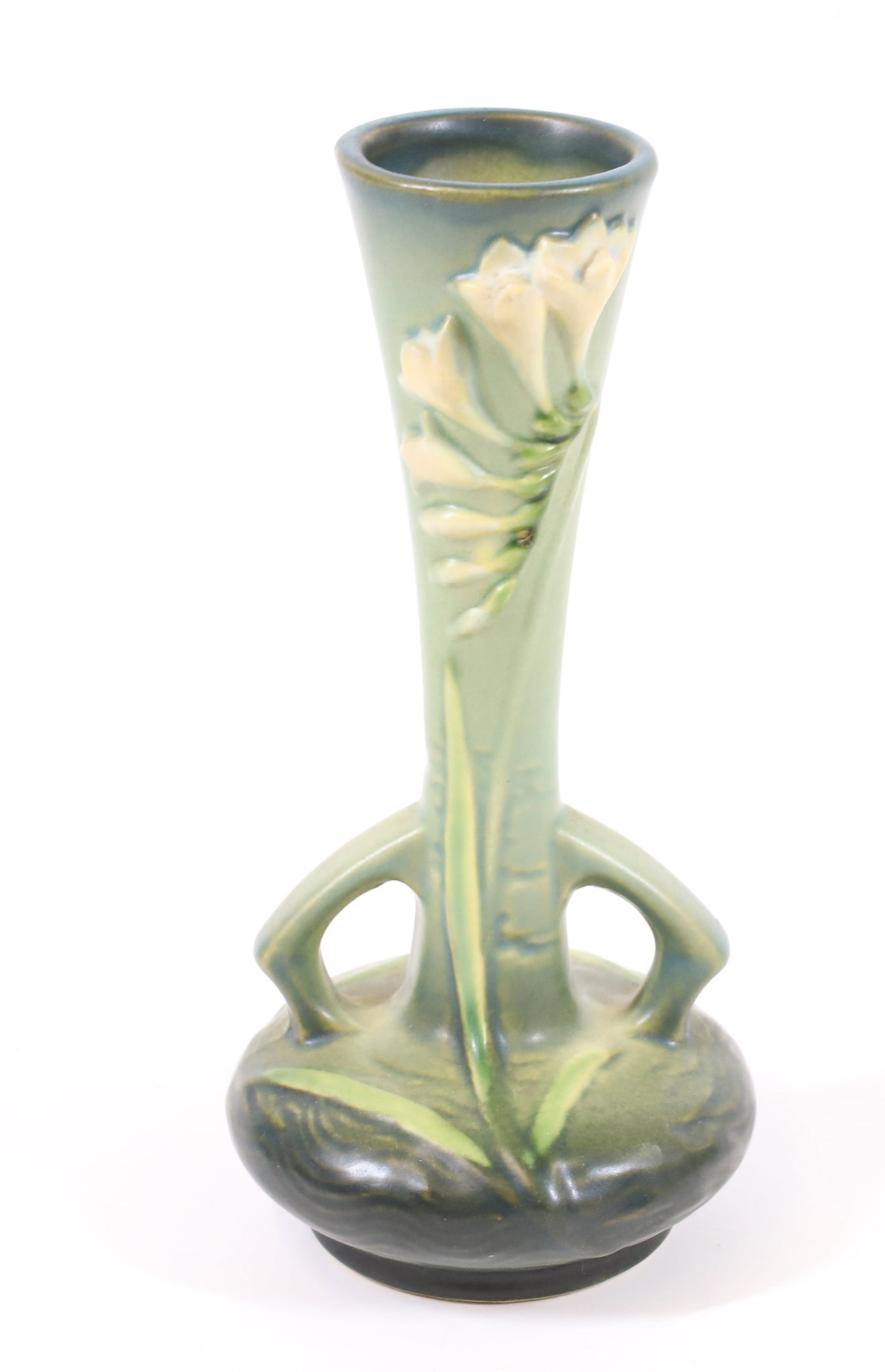 ROSEVILLE VASE: FREESIA 195-7" PLEASE READ CAREFULLY -THIS IS AN ONLINE ONLY AUCTION. WE WILL BE TAKING ABSENTEE AND PHONE BIDS ALSO. Terms for Purchasing and Shipping of Auction Items. Please read carefully before b