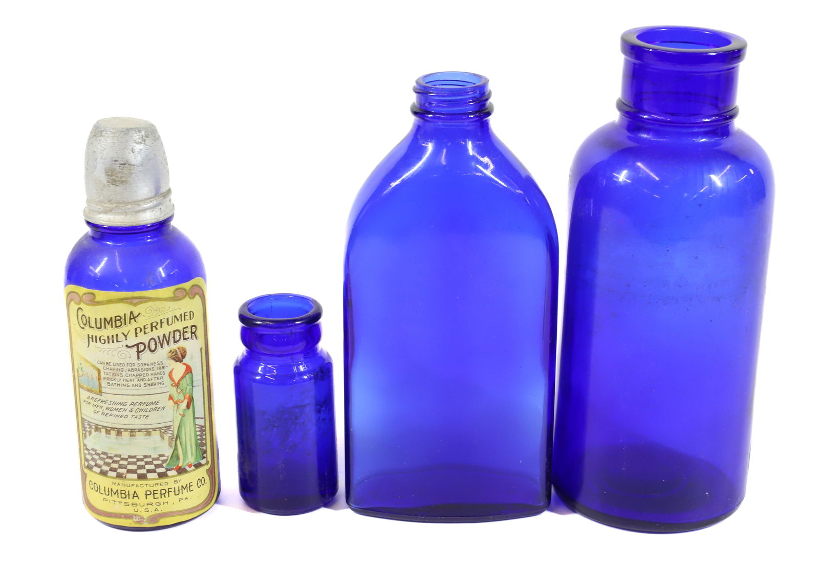 LOT OF COBALT BLUE BOTTLES (1 of 4)