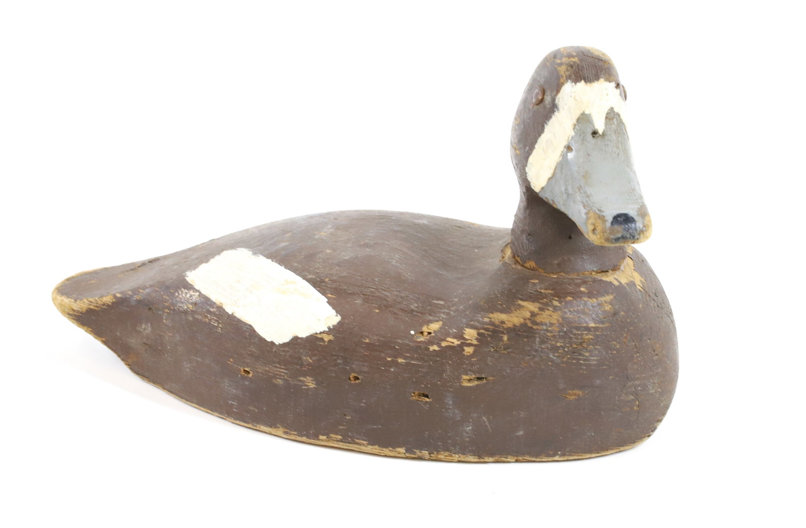 WOODEN DUCK DECOY: CARVED AND PAINTED. 11 1/2" L. PLEASE READ CAREFULLY -THIS IS AN ONLINE ONLY AUCTION. WE WILL BE TAKING ABSENTEE AND PHONE BIDS ALSO. Terms for Purchasing and Shipping of Auction Items. Please read ca