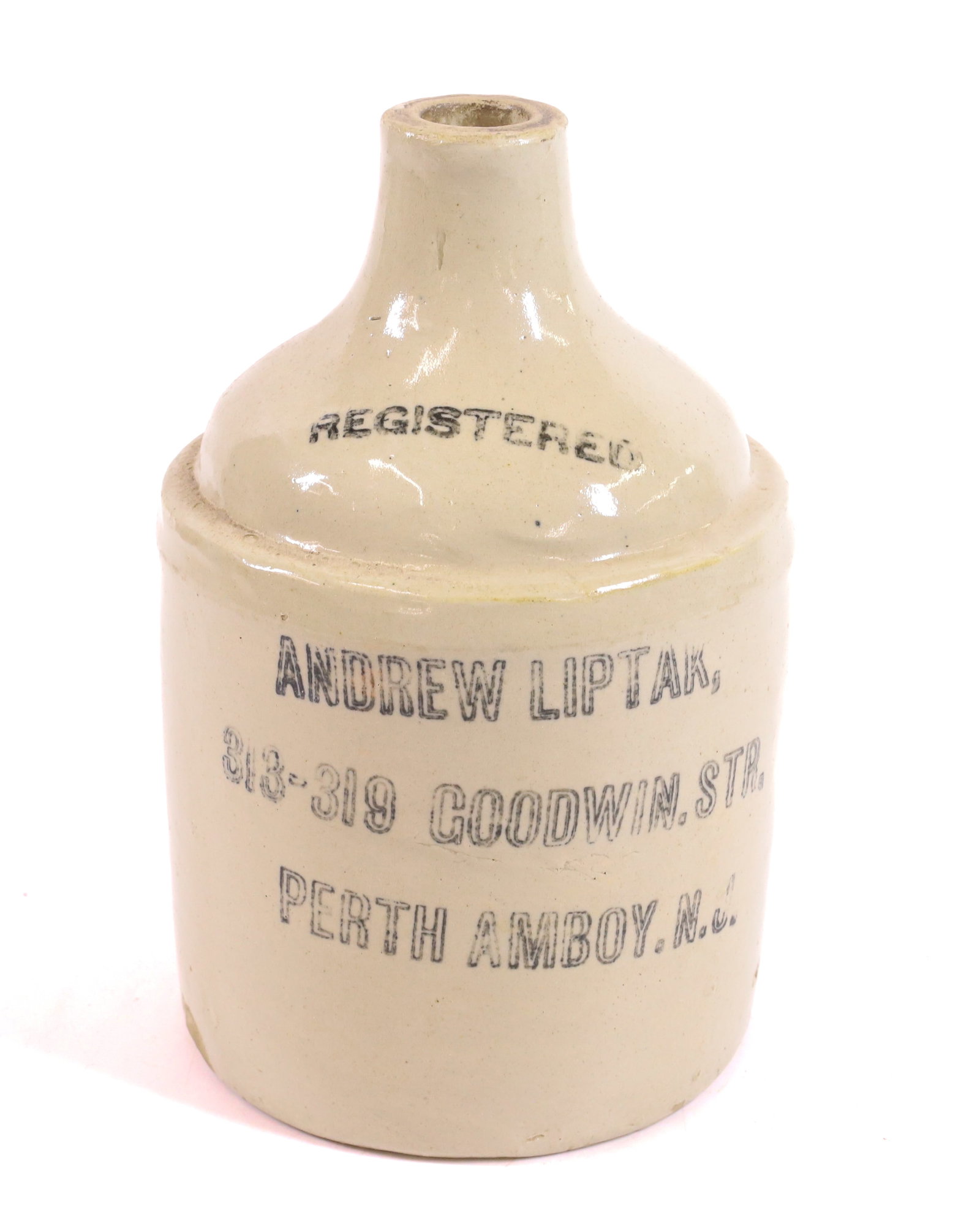 PERTH AMBOY, NJ ADVERTISING JUG: ANDREW LIPTAR. 9" H. PLEASE READ CAREFULLY -THIS IS AN ONLINE ONLY AUCTION. WE WILL BE TAKING ABSENTEE AND PHONE BIDS ALSO. Terms for Purchasing and Shipping of Auction Items. Please read carefully be
