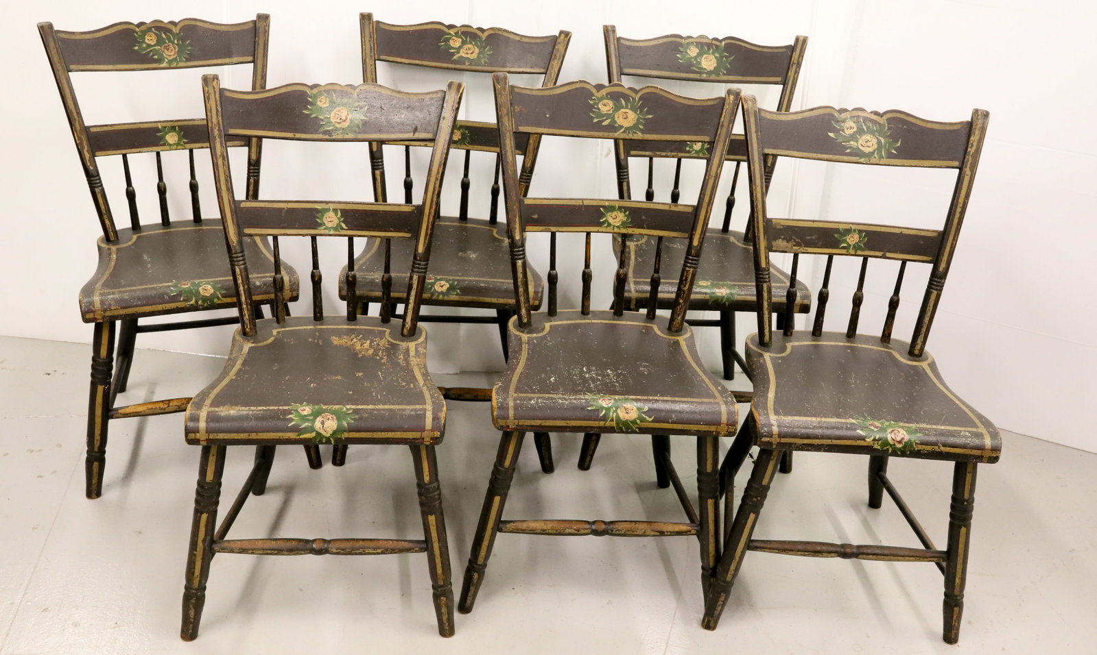 (6) PAINTED COUNTRY CHAIRS: HALF-SPINDLE BACKS WITH FLORAL DECORATION. 32" X 14" X 15 1/2". PLEASE READ CAREFULLY -THIS IS AN ONLINE ONLY AUCTION. WE WILL BE TAKING ABSENTEE AND PHONE BIDS ALSO. Terms for Purchasing and Shipping