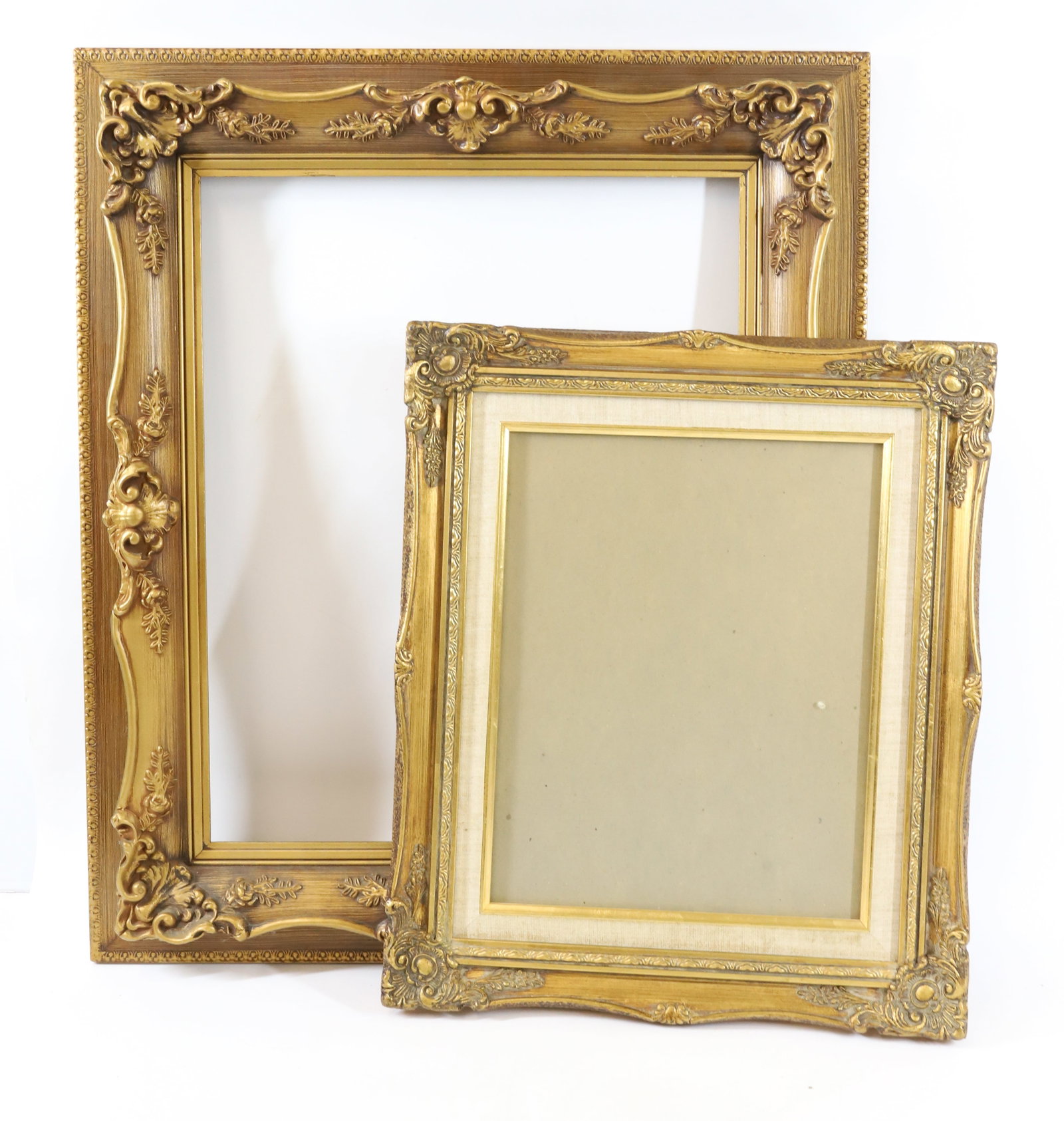 (2) ORNATE GOLD FRAMES: 19 1/4" X 16 1/4" WITH GLASS (INTERIOR 13 1/2" X 10 1/2") AND 27" X 23" (INTERIOR 19 1/2" X 15 1/2"). PLEASE READ CAREFULLY -THIS IS AN ONLINE ONLY AUCTION. WE WILL BE TAKING ABSENTEE AND PHONE BIDS A