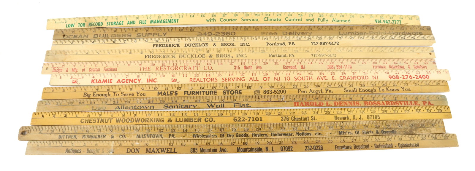 LOT OF ADVERTISING YARDSTICKS: (11) INCLUDING: DUCKLOE, MALE'S FURNITURE STORE, DON MAXWELL ANTIQUES, BITTNER, HUNSICKER & CO. AND MORE. PLEASE READ CAREFULLY -THIS IS AN ONLINE ONLY AUCTION. WE WILL BE TAKING ABSENTEE AND PHONE BI