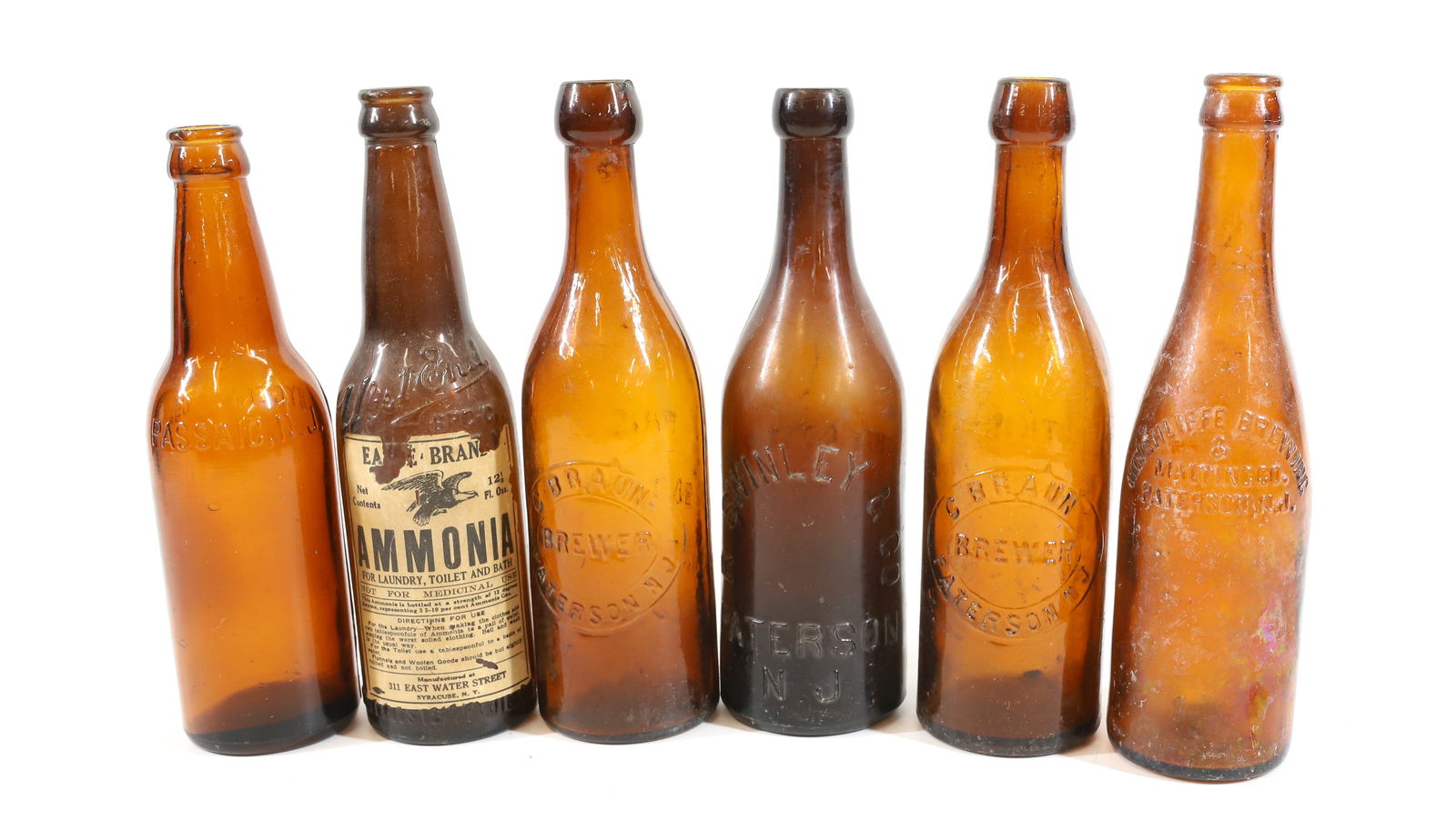 LOT OF AMBER ADVERTISING BOTTLES (1 of 6)