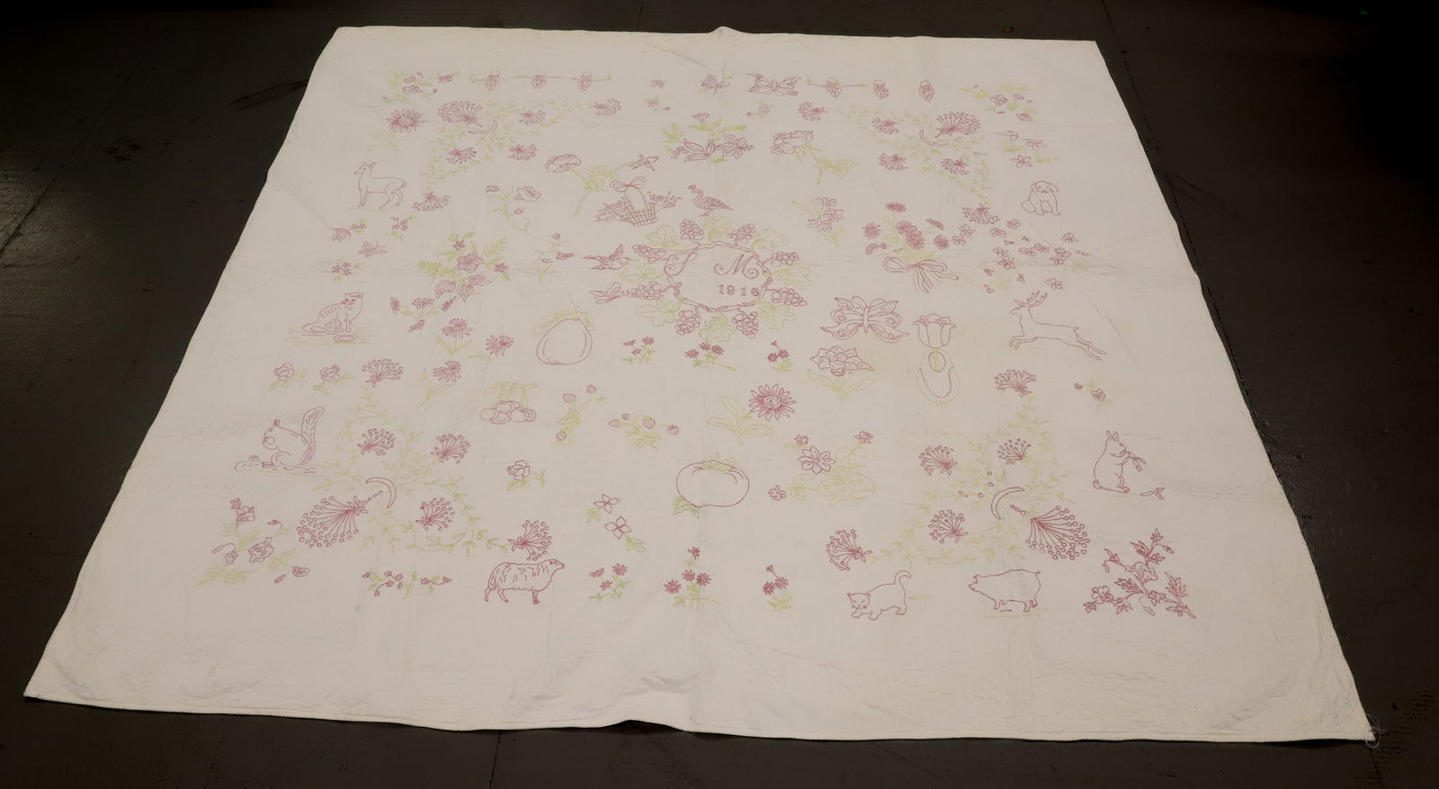 HAND STITCHED ANIMAL AND FLORAL QUILT (1 of 5)