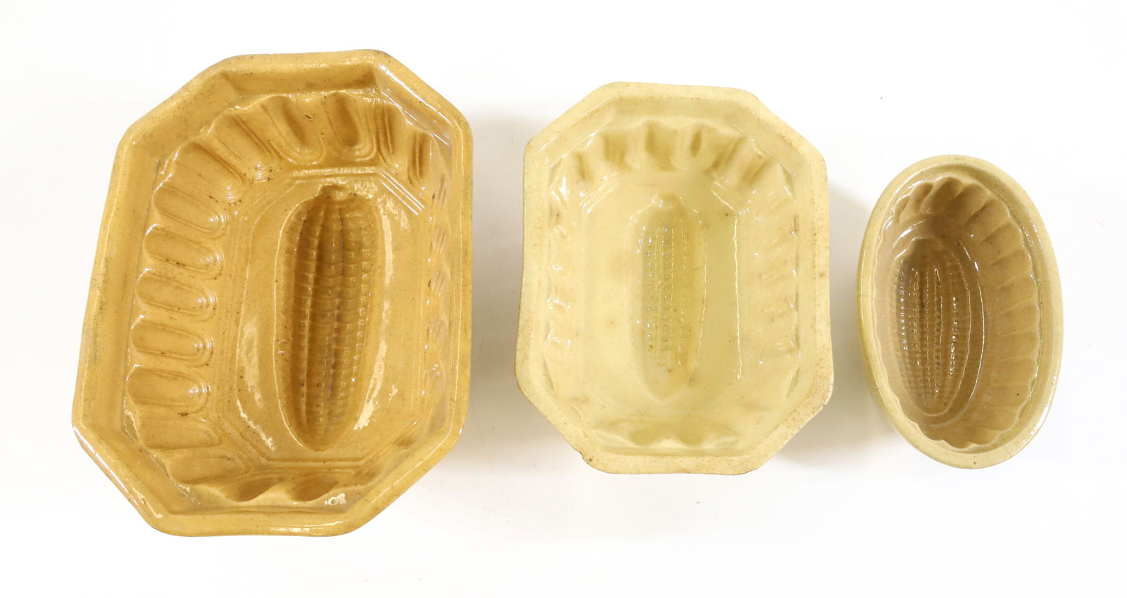 (3) YELLOW WARE FOOD MOLDS (1 of 4)