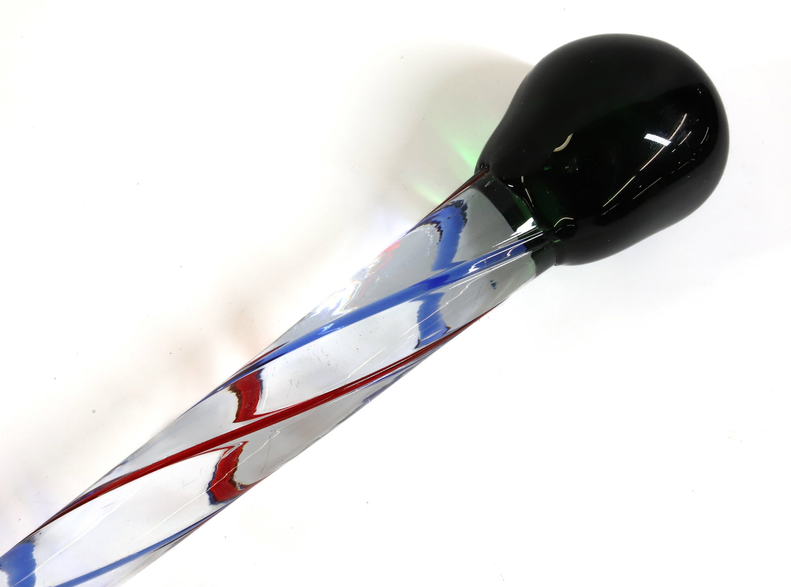 BLOWN GLASS PARADE STICK: RED AND BLUE STRIPING ON CLEAR WITH GREEN KNOB ON TOP - 36" L PLEASE READ CAREFULLY - Terms for Purchasing and Shipping of Auction Items. Please read carefully before bidding. All payments for purchas