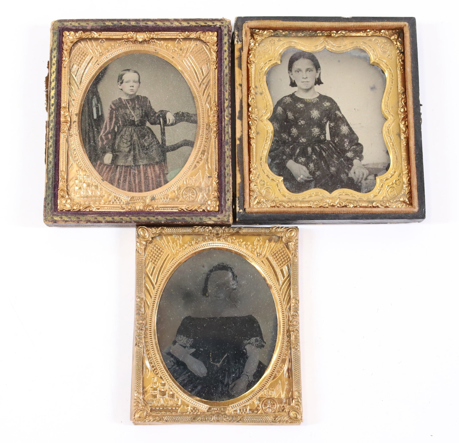 (3) AMBROTYPE PHOTOGRAPHS: TWO IN PARTIAL CASES. ONE COLOR TINTED. 3 1/4" X 2 3/4". PLEASE READ CAREFULLY - Terms for Purchasing and Shipping of Auction Items. Please read carefully before bidding. All payments for purchases wi
