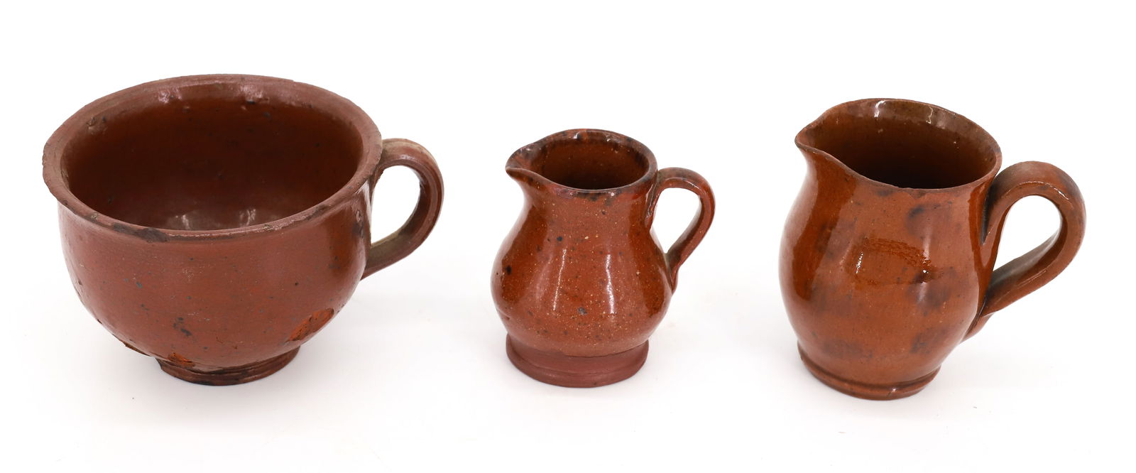 REDWARE HANDLED CUP AND TWO CREAMERS (1 of 4)