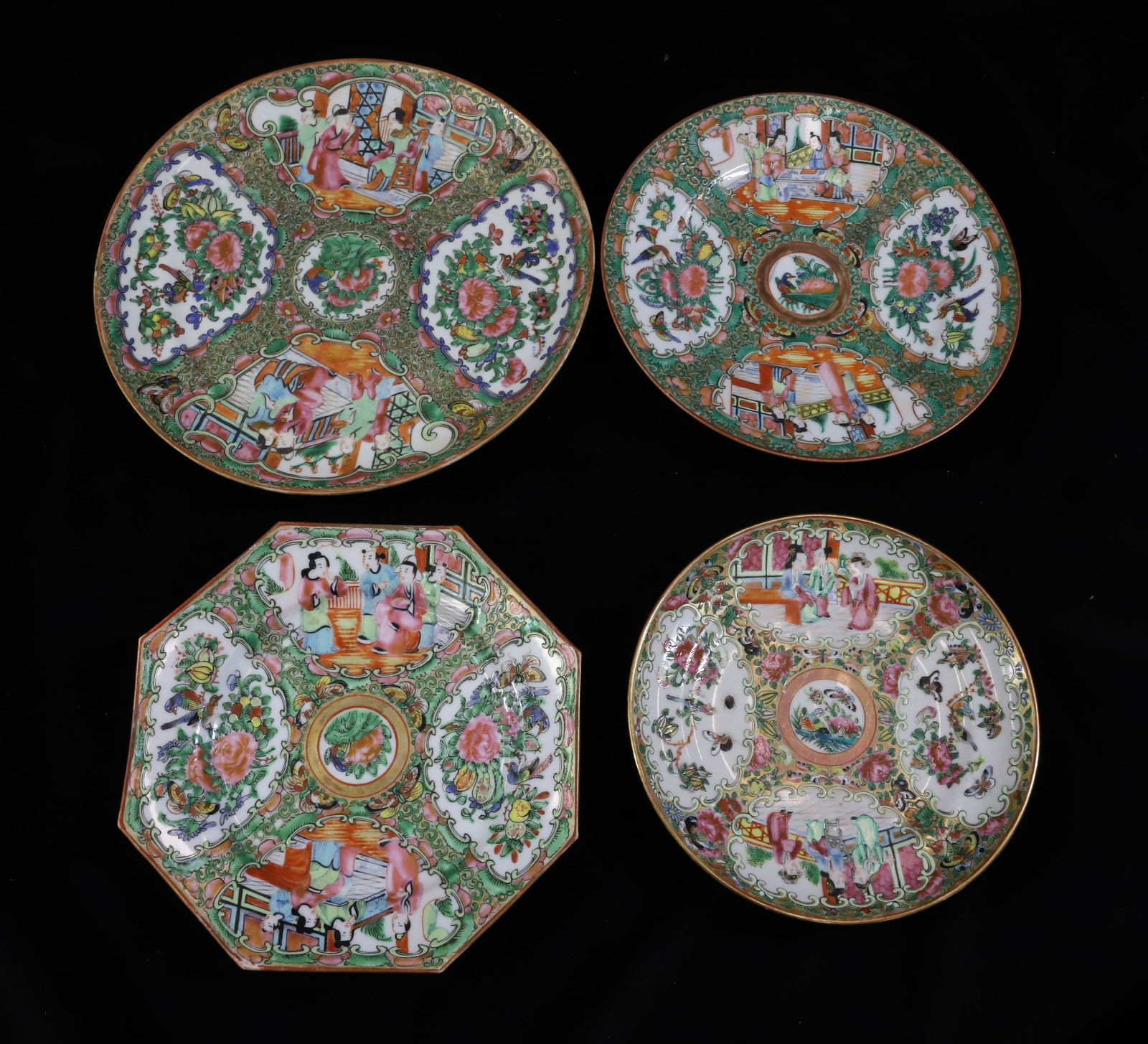 (4) FAMILLE ROSE: FOUR PLATES THREE ROUND AND ONE OCTAGONAL ALL WITH FOUR PANEL DECORATION FAMILLE ROSE, COURTIERS, BUTTERFLIES AND BUGS 6 1/4"DIA TO 8 1/2"DIA PLEASE READ CAREFULLY - Terms for Purchasing and Shipping