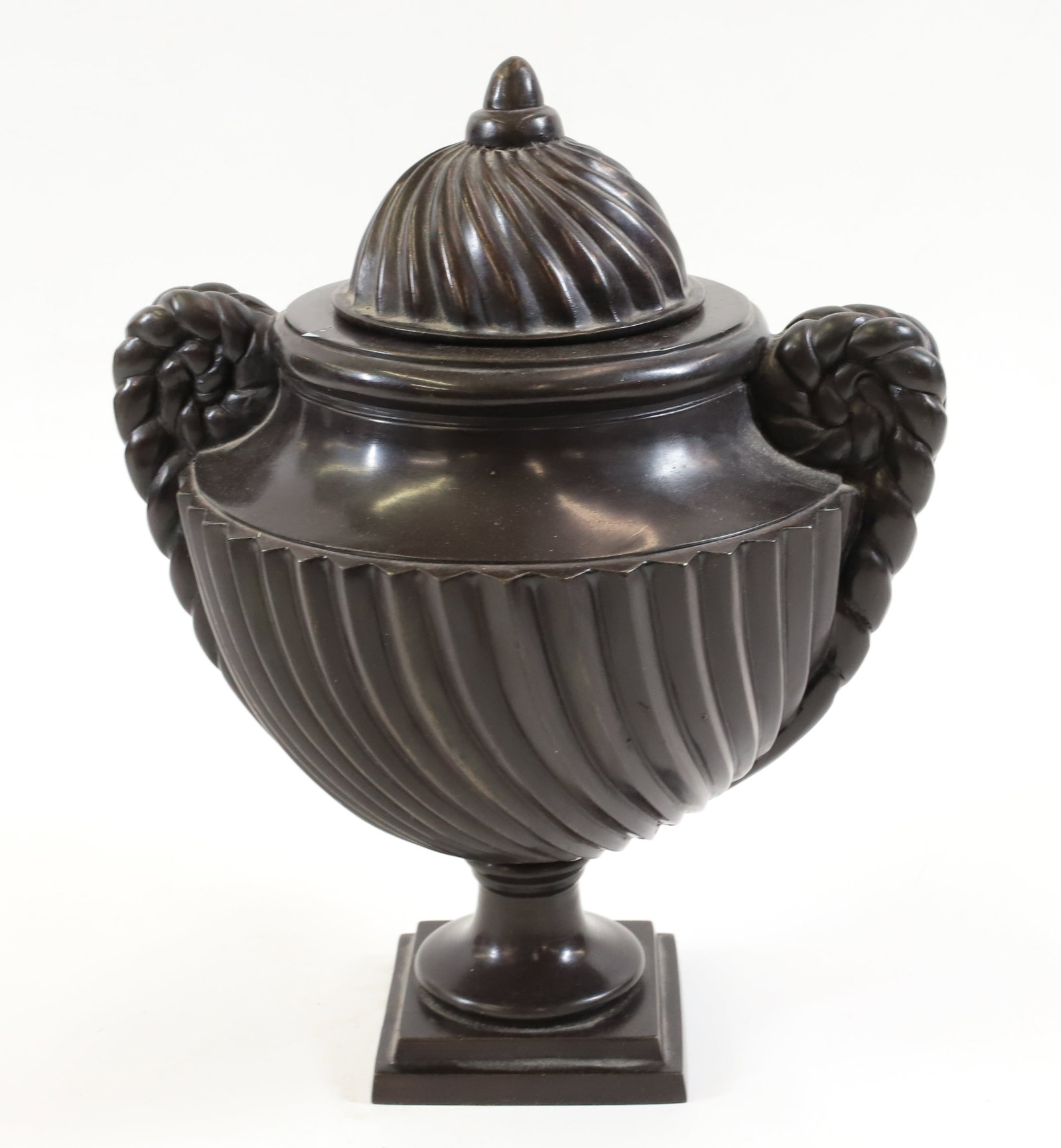 BRONZE URN: BRONZE LIDDED URN CONTEMPORARY TWISTED ROPE HANDLES 12" X 9" PLEASE READ CAREFULLY - Terms for Purchasing and Shipping of Auction Items. Please read carefully before bidding. All payments for purchase