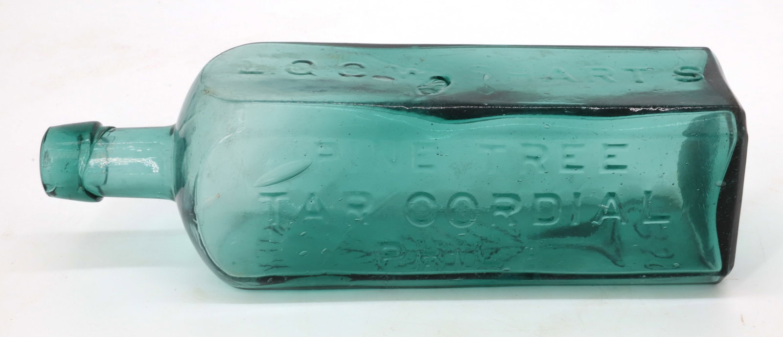PINE TREE TAR CORDIAL BOTTLE: EMBOSSED PATENT 1859, WITH PINE TREE, LQC WISHART'S - MEDIUM GREEN. 9 5/8" H. PLEASE READ CAREFULLY - Terms for Purchasing and Shipping of Auction Items. Please read carefully before bidding. All paym