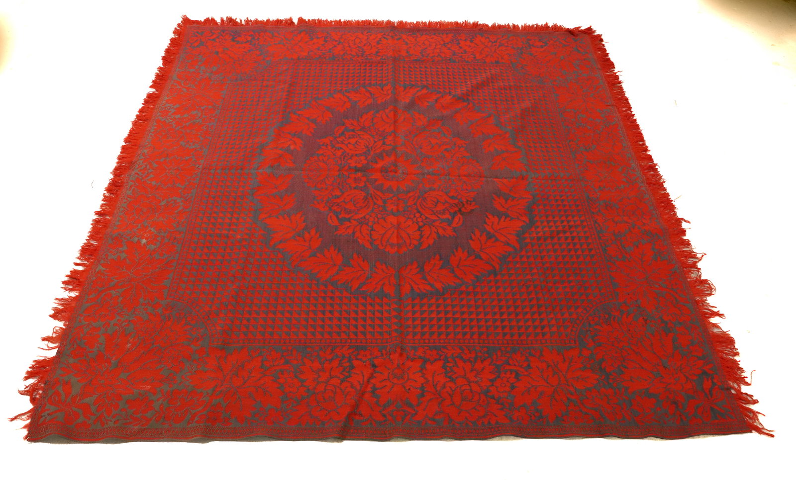19TH CENTURY BLUE AND RED COVERLET: CENTRAL FLORAL MEDALLION, LEAF AND FLORAL BORDER, FRINGED EDGE, 77" X 76" PLEASE READ CAREFULLY - Terms for Purchasing and Shipping of Auction Items. Please read carefully before bidding. All payments