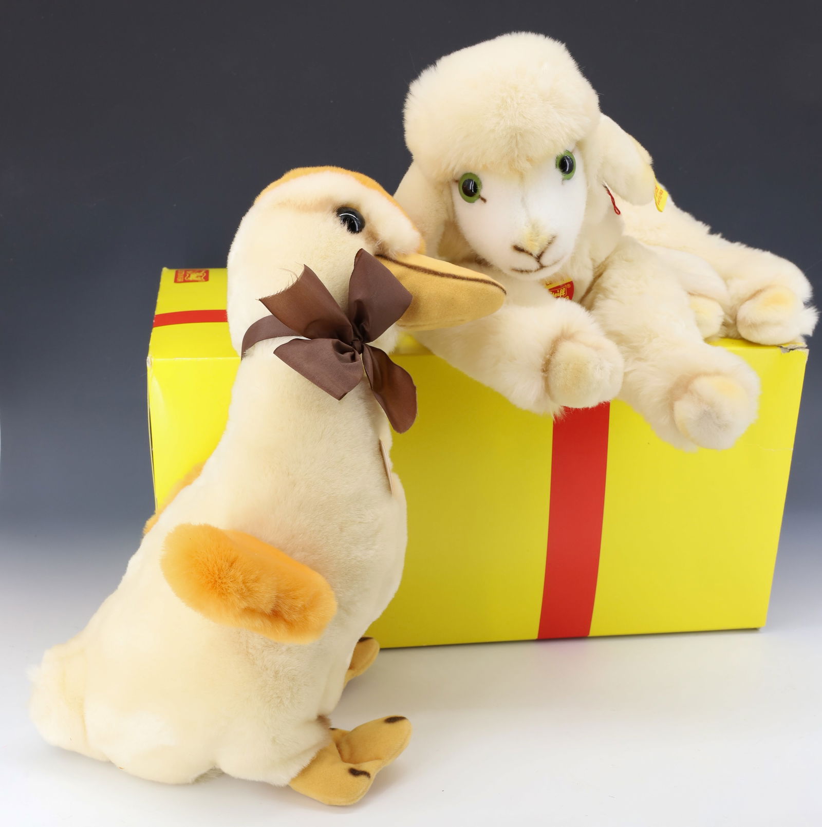 VINTAGE (2) STEIFF ANIMALS DUCK AND LAMB: KUSCHEL AND COSY LAMBY BUTTONS AND TAGS 16" PLEASE READ CAREFULLY - Terms for Purchasing and Shipping of Auction Items. Please read carefully before bidding. All payments for purchases will be made th