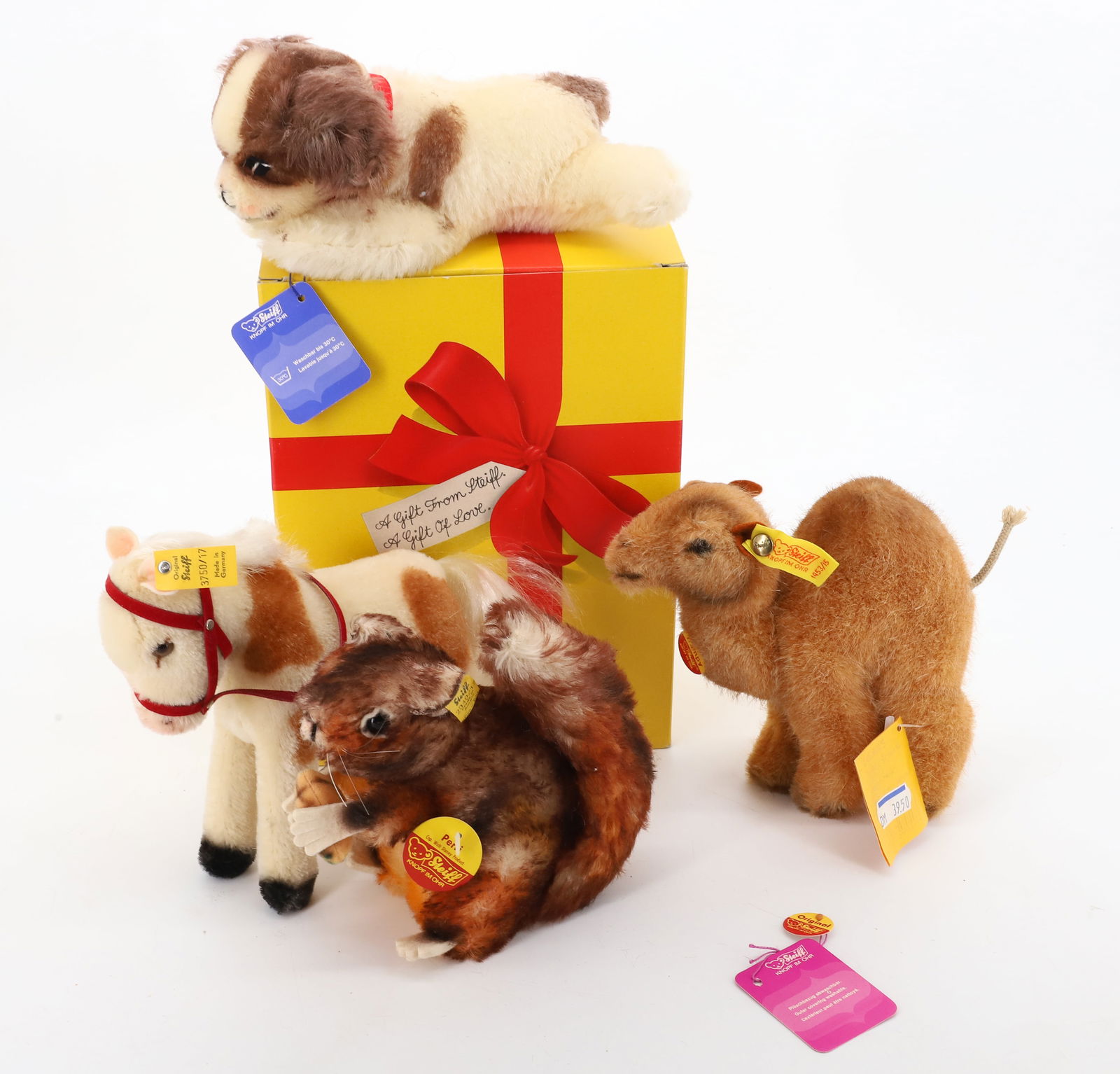 VINTAGE (4) STEIFF ANIMALS DOG,HORSE, SQUIRREL AND CAMEL: DOG,HORSE,SQUIRREL AND CAMEL BUTTONS AND TAGS 6" PLEASE READ CAREFULLY - Terms for Purchasing and Shipping of Auction Items. Please read carefully before bidding. All payments for purchases will be ma