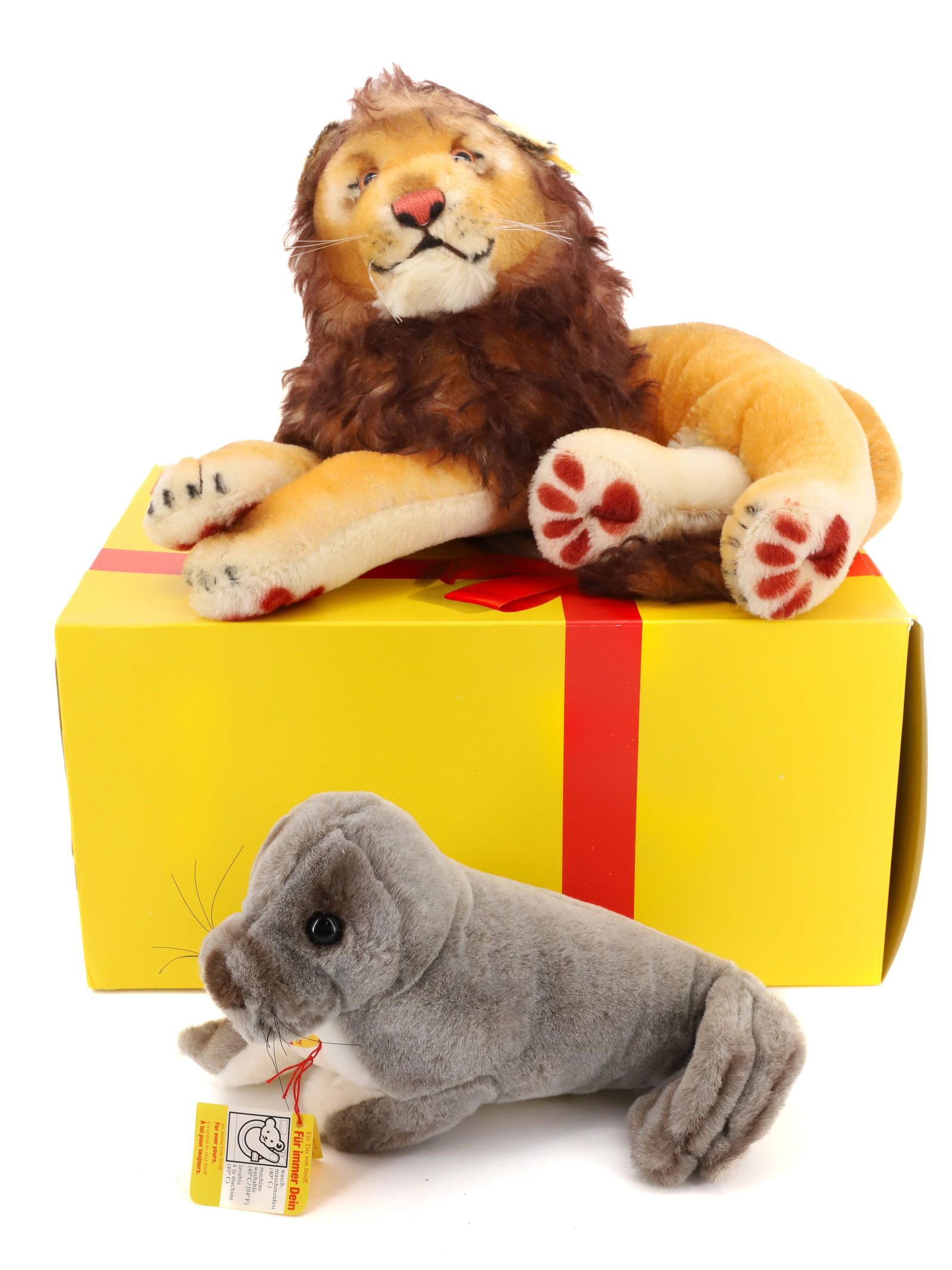 VINTAGE (2) STEIFF LION AND SEAL: LION AND SEAL BUTTONS AND TAGS 16",10" PLEASE READ CAREFULLY - Terms for Purchasing and Shipping of Auction Items. Please read carefully before bidding. All payments for purchases will be made through