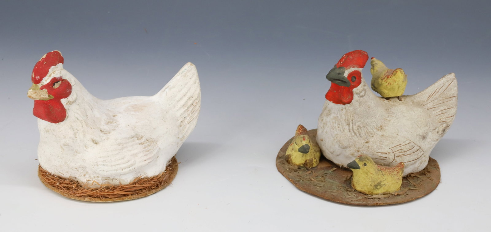 (2) COMPOSITION CHICKENS AND CHICKS: ONE WITH CHICKS IS STAMPED "GERMANY" ON BOTTOM 5" L. AND OTHER IS MRKD. IN PENCIL OF OWNER "ANDY LOTTIE OXFORD". PLEASE READ CAREFULLY - Terms for Purchasing and Shipping of Auction Items. Please read