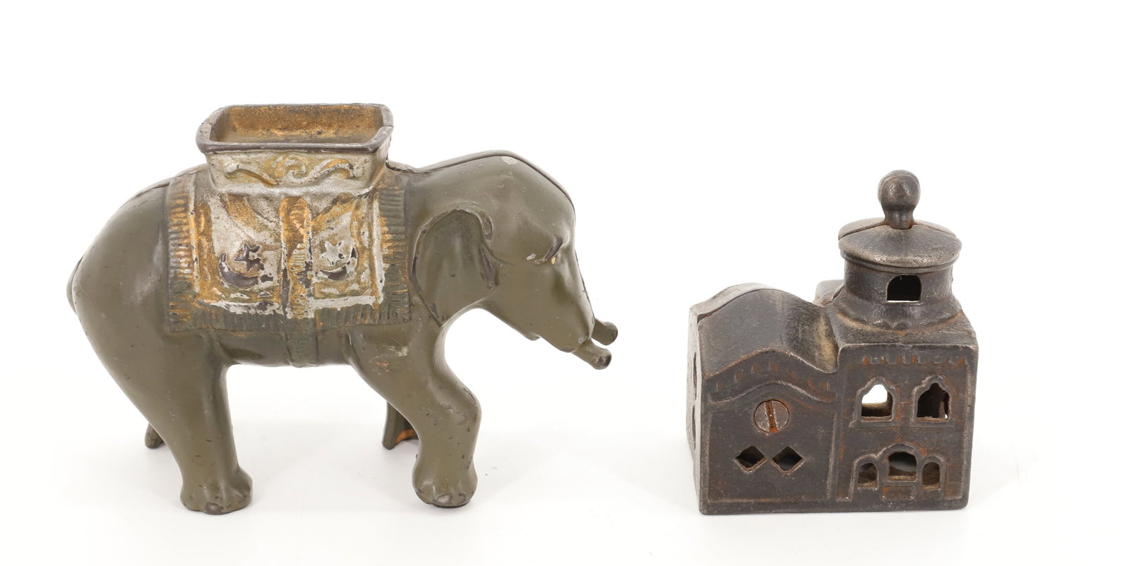 (2) CAST IRON STILL BANKS: CAST IRON PAINTED ELEPHANT 5" AND MOSQUE BANK 2 1/2" L. PLEASE READ CAREFULLY - Terms for Purchasing and Shipping of Auction Items. Please read carefully before bidding. All payments for purchases wil