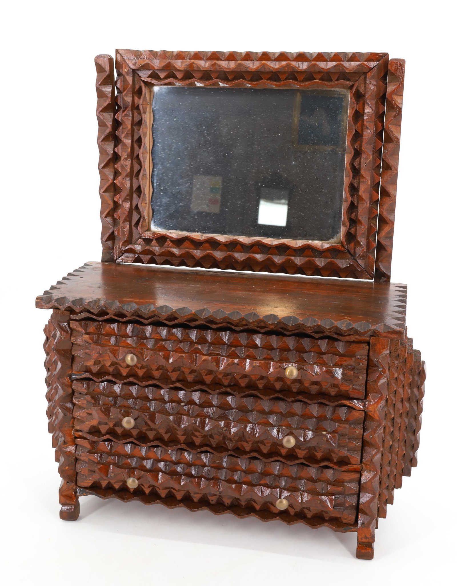 MINIATURE TRAMP ART DRESSER: CHIP CARVED LAYERS WITH TILTING MIRROR ON BACK. THREE LONG DRAWERS. VARNISHED FINISH. 16 1/2" X 14" X 5". PLEASE READ CAREFULLY - Terms for Purchasing and Shipping of Auction Items. Please read carefu