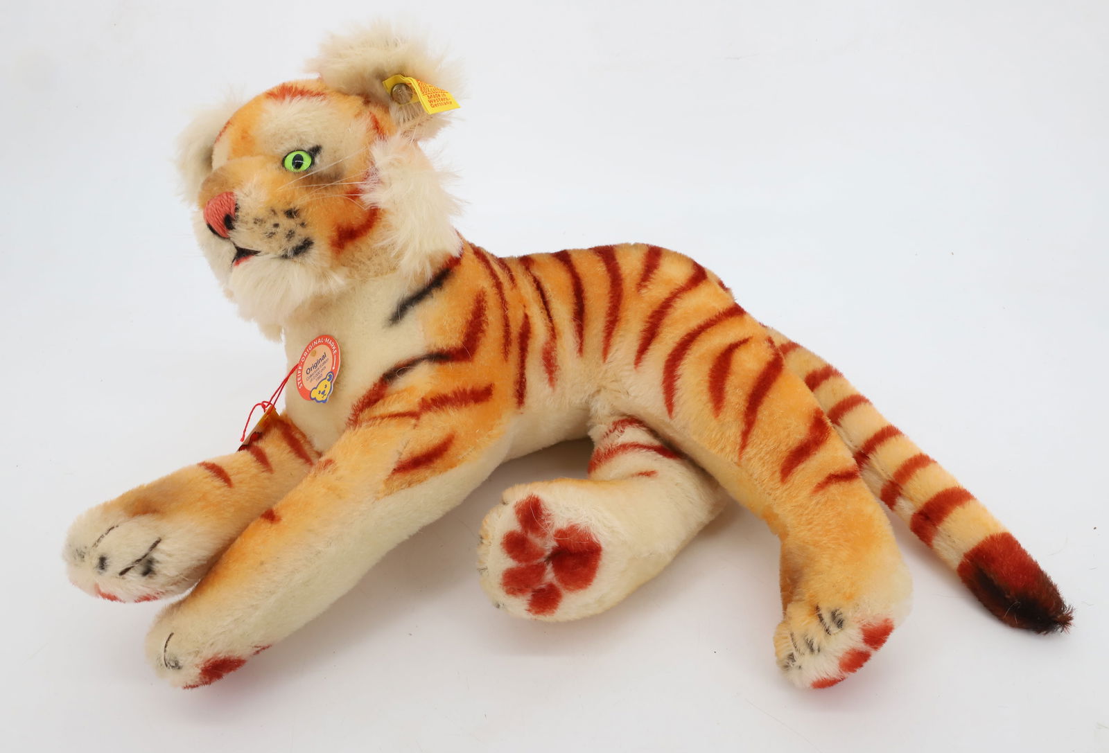 VINTAGE STEIFF TIGER: TIGER BUTTON AND TAG 14" PLEASE READ CAREFULLY - Terms for Purchasing and Shipping of Auction Items. Please read carefully before bidding. All payments for purchases will be made through LiveAuctionee