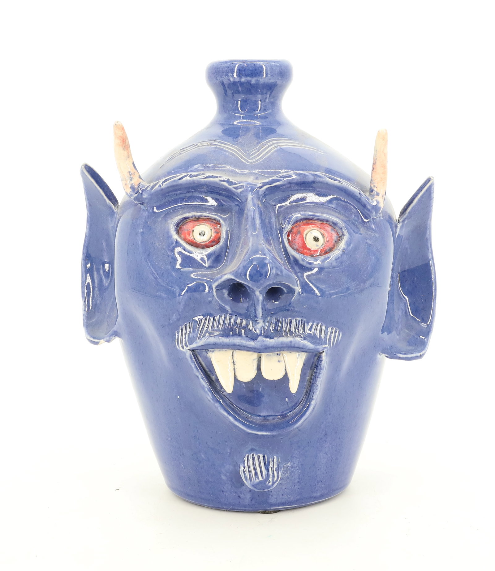 STEVE TURPIN POTTERY DEVIL FACE JUG: LONG TOOTH DEVIL. SGN/ DATED 1999, BLUE DEVIL, HOMER GA. ON BOTTOM. 9 1/2" H. PLEASE READ CAREFULLY - Terms for Purchasing and Shipping of Auction Items. Please read carefully before bidding. All paym