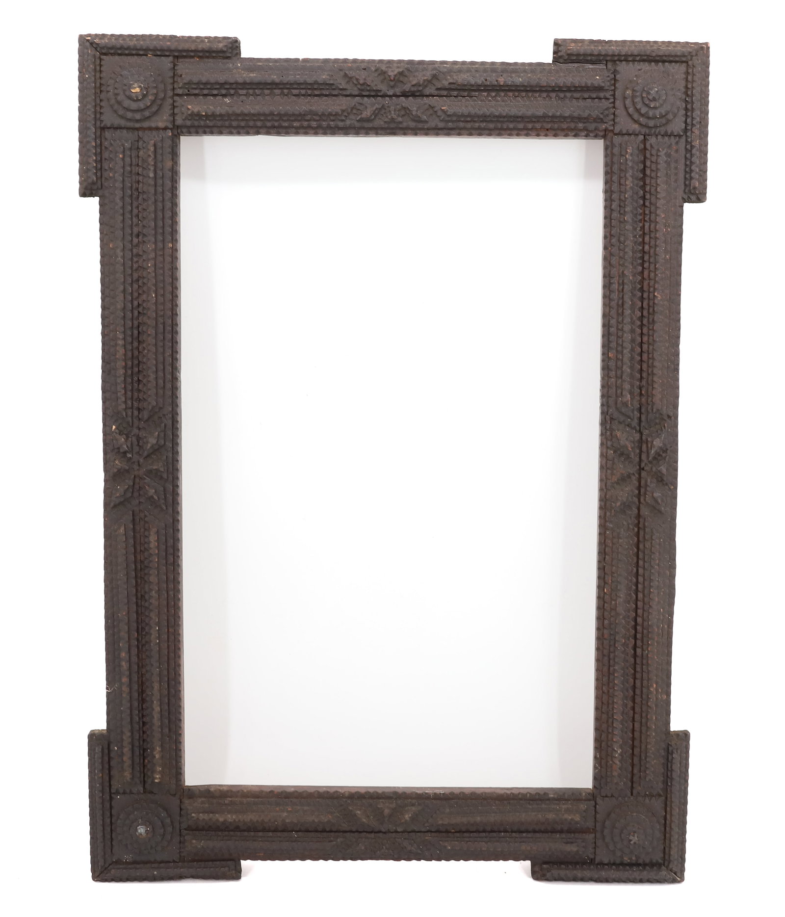 TRAMP ART FRAME: CHIP CARVED FRAME IN DARK FINISH. 22 3/4" X 16 1/4". SIGHT VIEW 17 1/2" X 11 1/4". PLEASE READ CAREFULLY - Terms for Purchasing and Shipping of Auction Items. Please read carefully before bidding. All